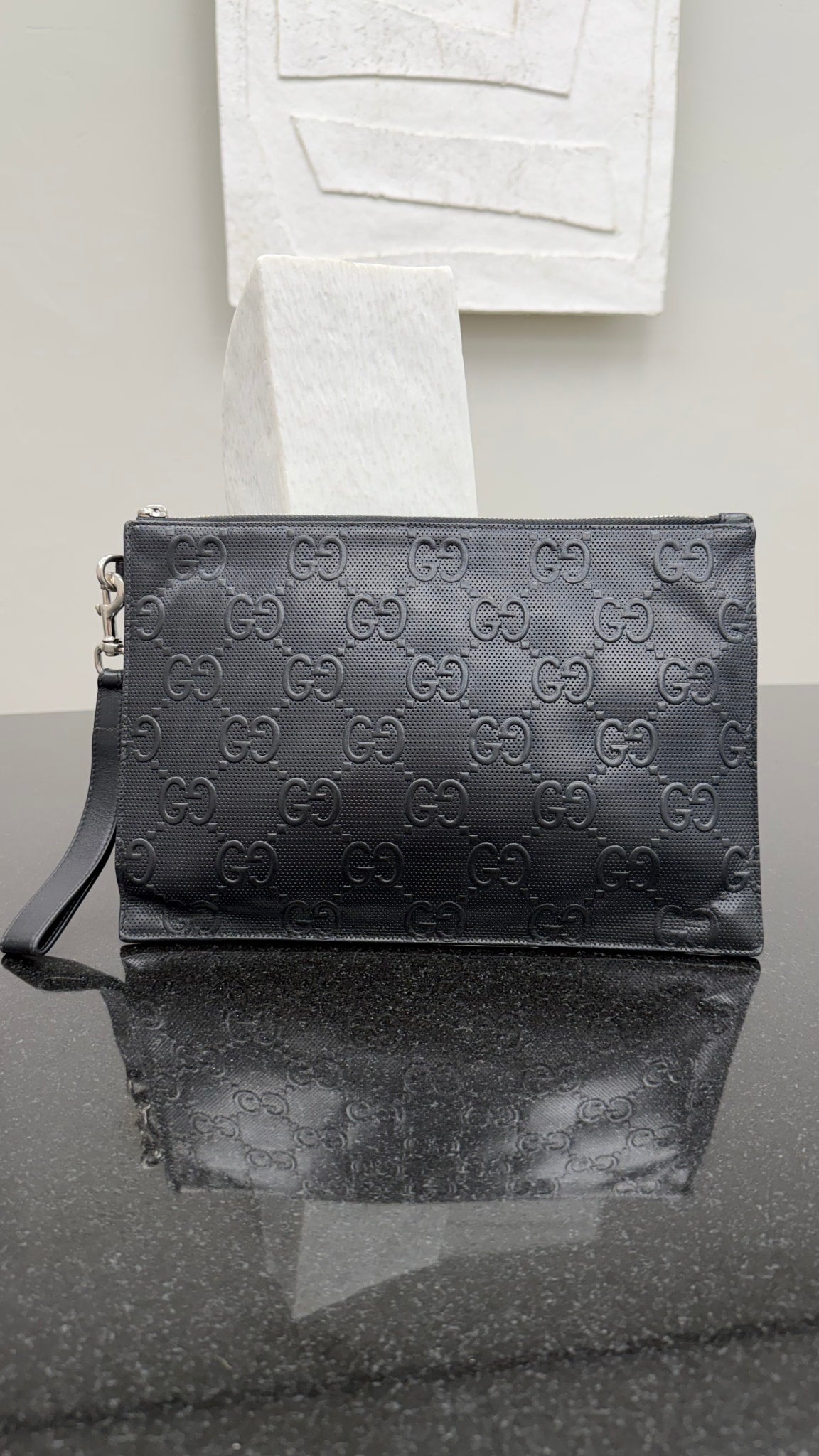 Gucci GG Embossed Perforated Leather Wristlet