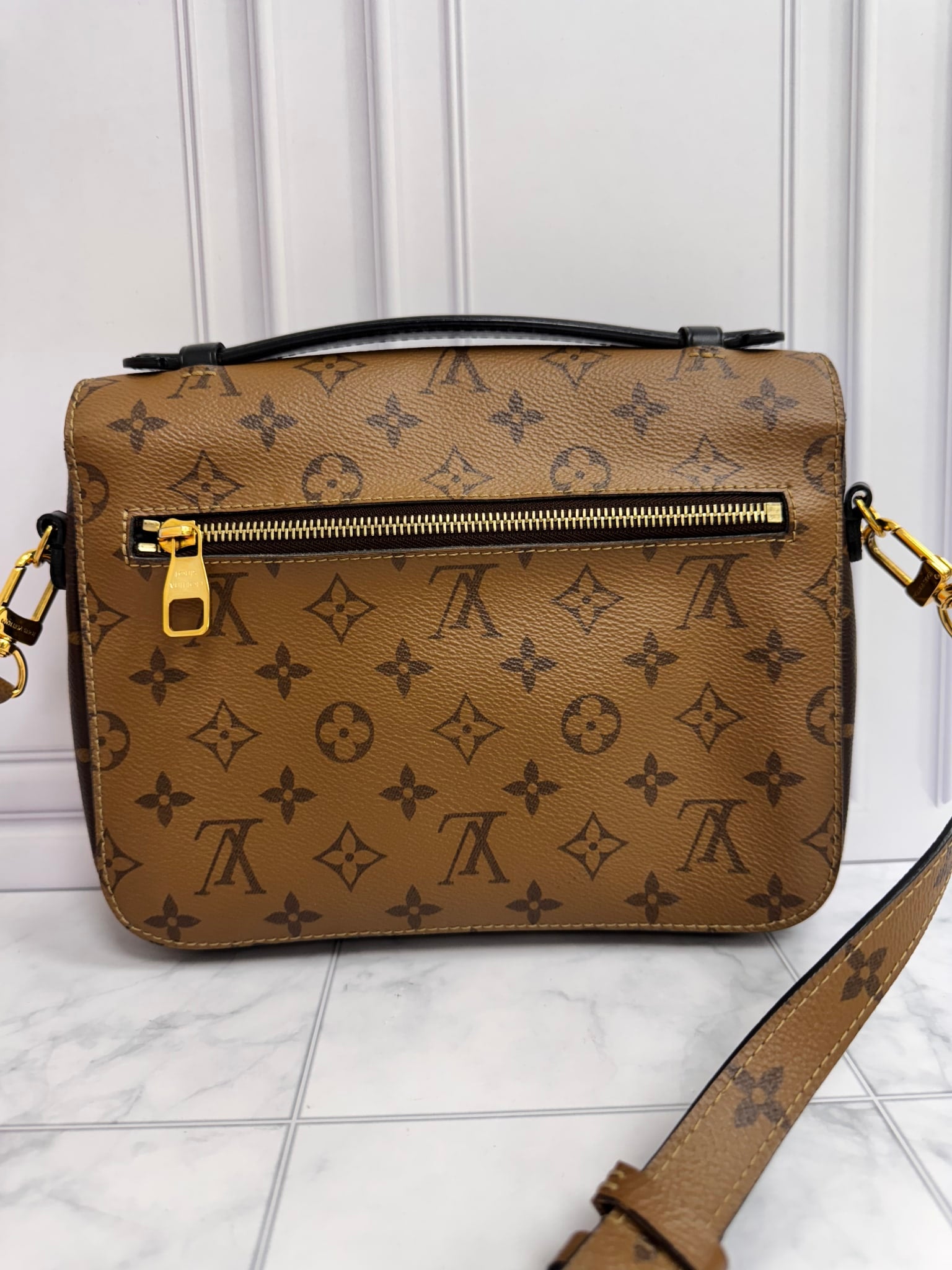 Louis Vuitton Reverse Monogram Pochette Metise