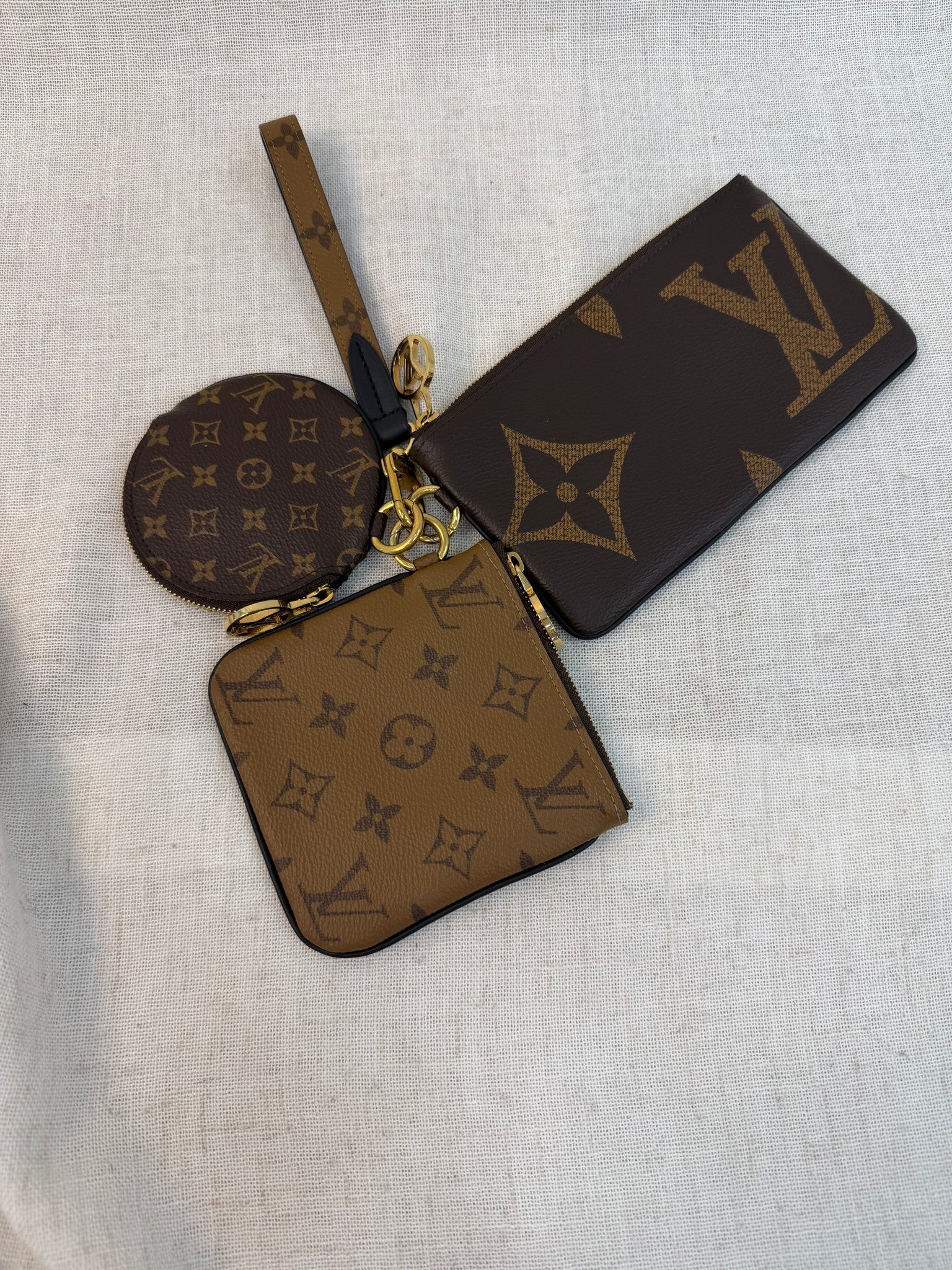Louis Vuitton Reverise Monogram Trio Pouch Set