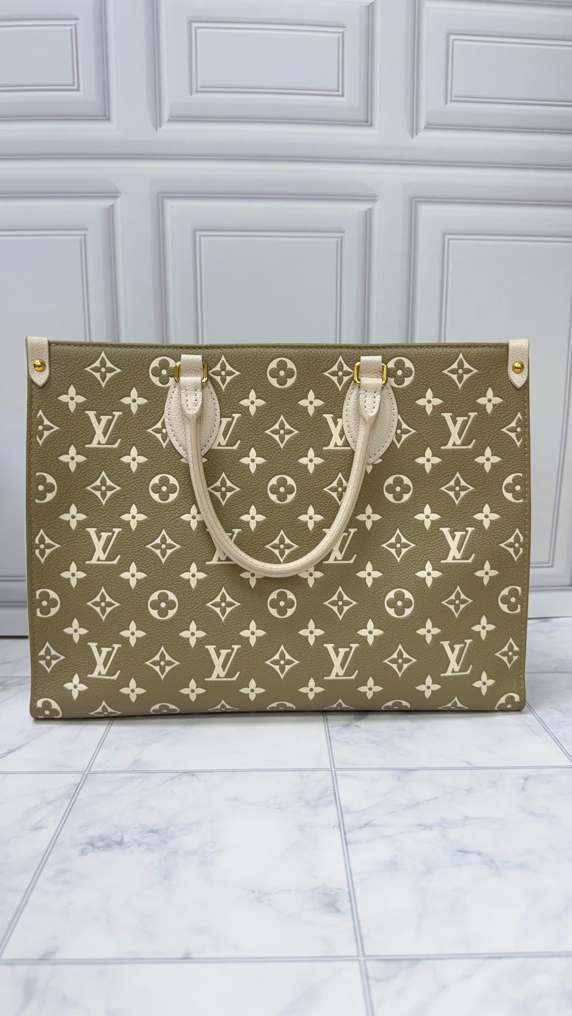 Louis Vuitton Green And Cream Monogram Empreinte Leather On The Go Handbag