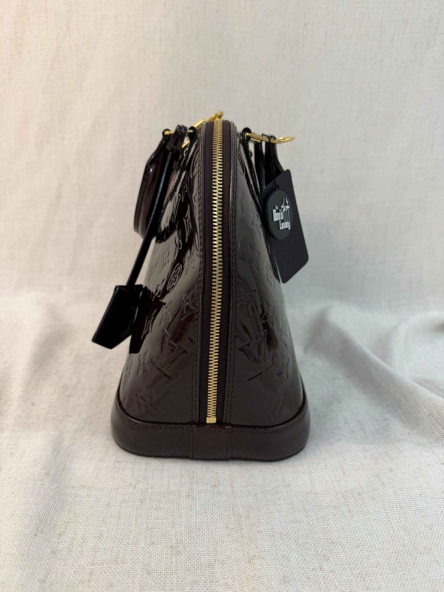 Louis Vuitton Amarante Vernis Leather Alma PM Bag