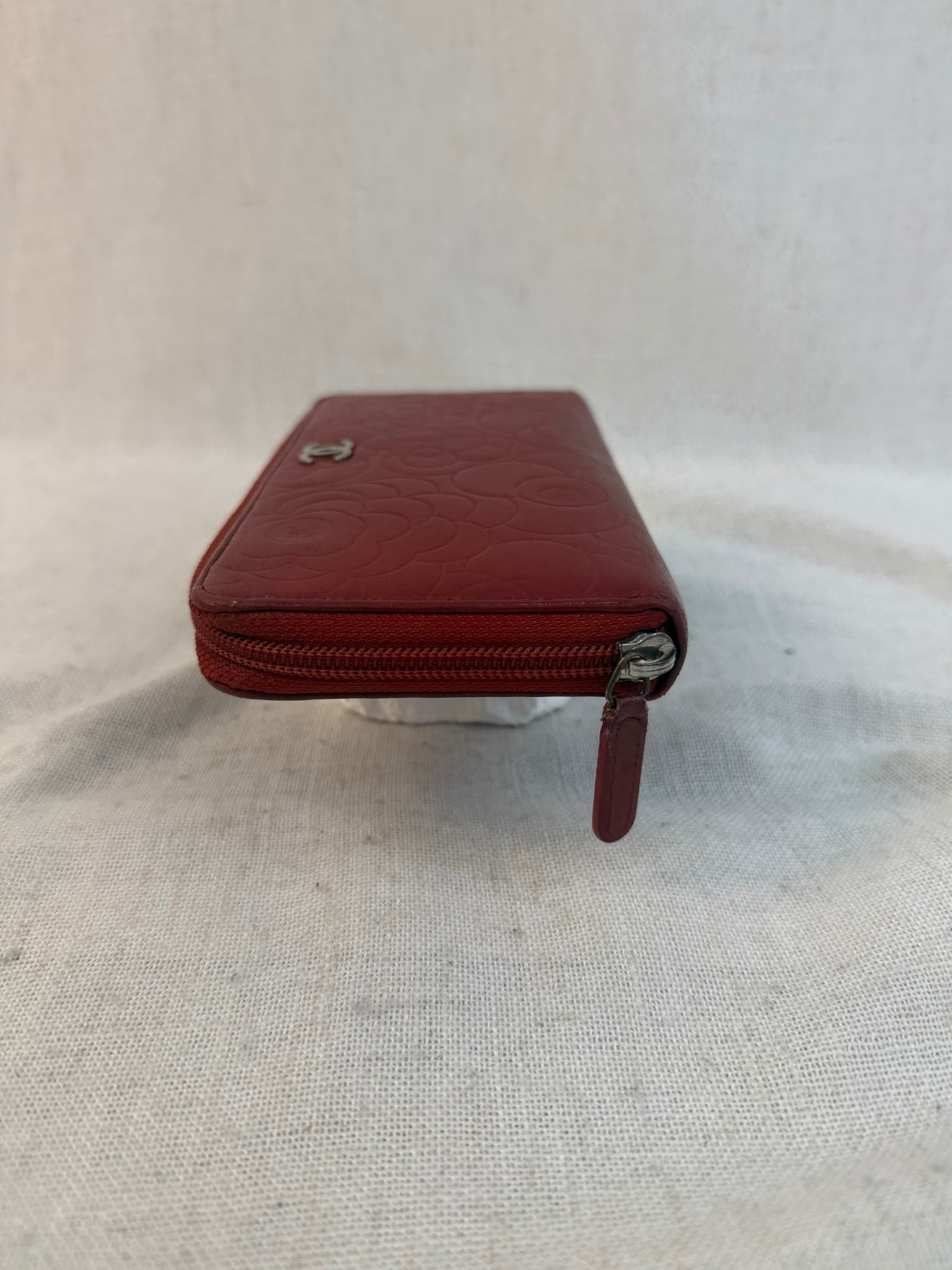 Chanel Red Lambskin Camellia Embossed Zippy Wallet