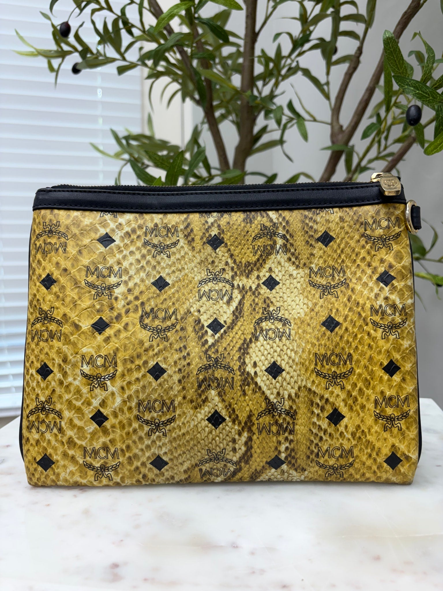MCM Yellow Python Embossed Clutch