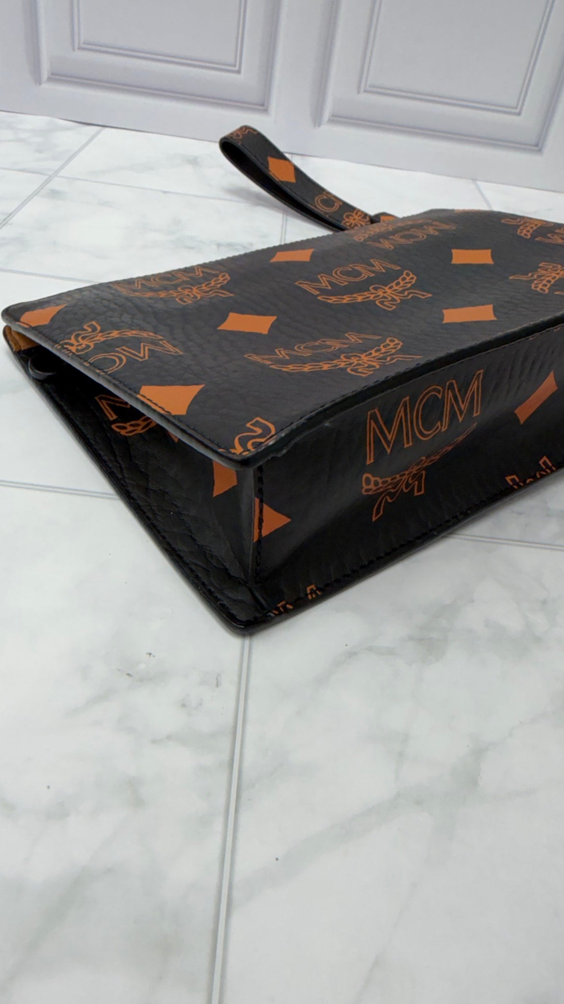MCM Black & Orange Coated Canvas Pouch