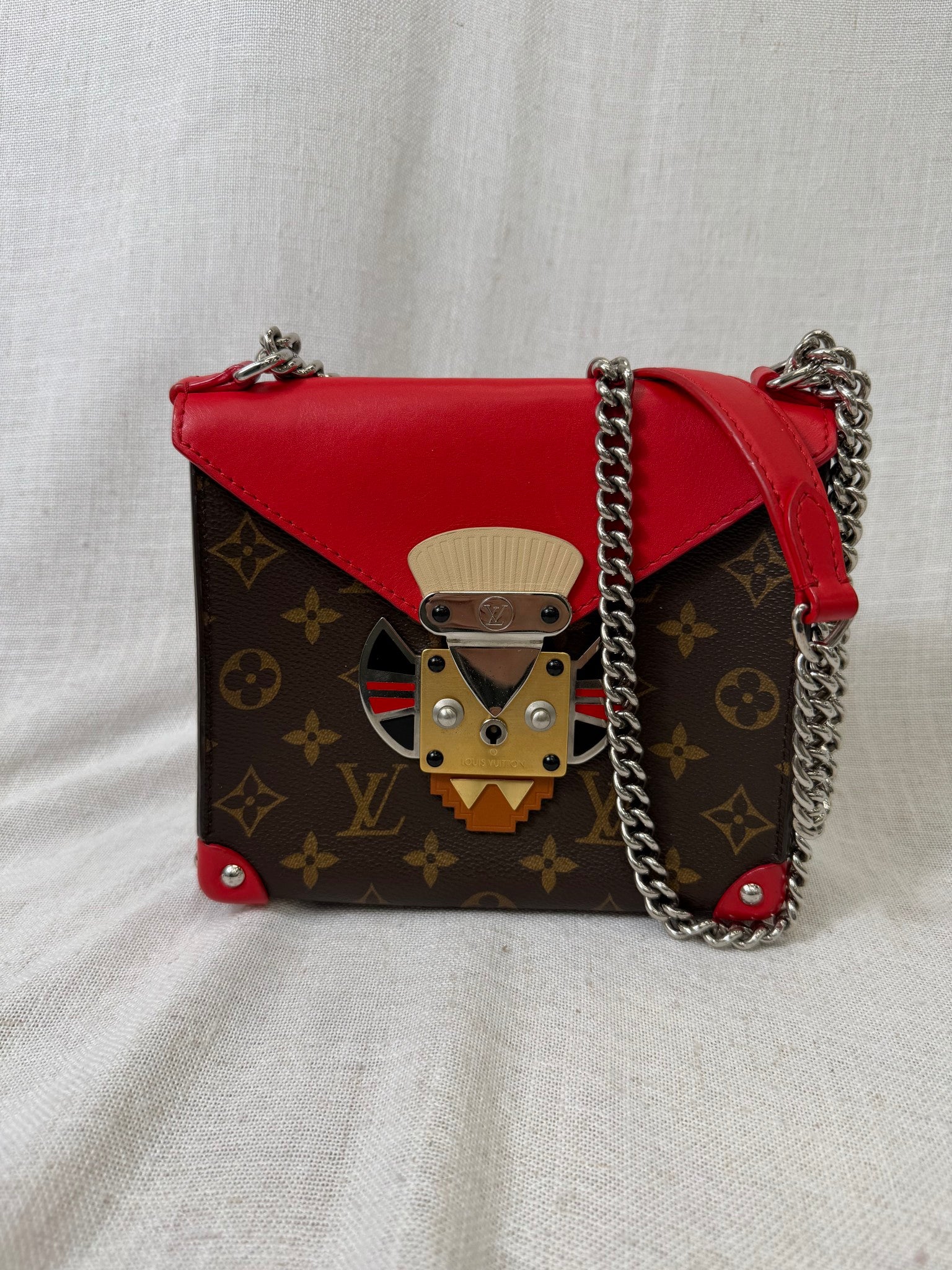 Louis Vuitton Rouge Limited Edition Tribal Mask Pochette Crossbody