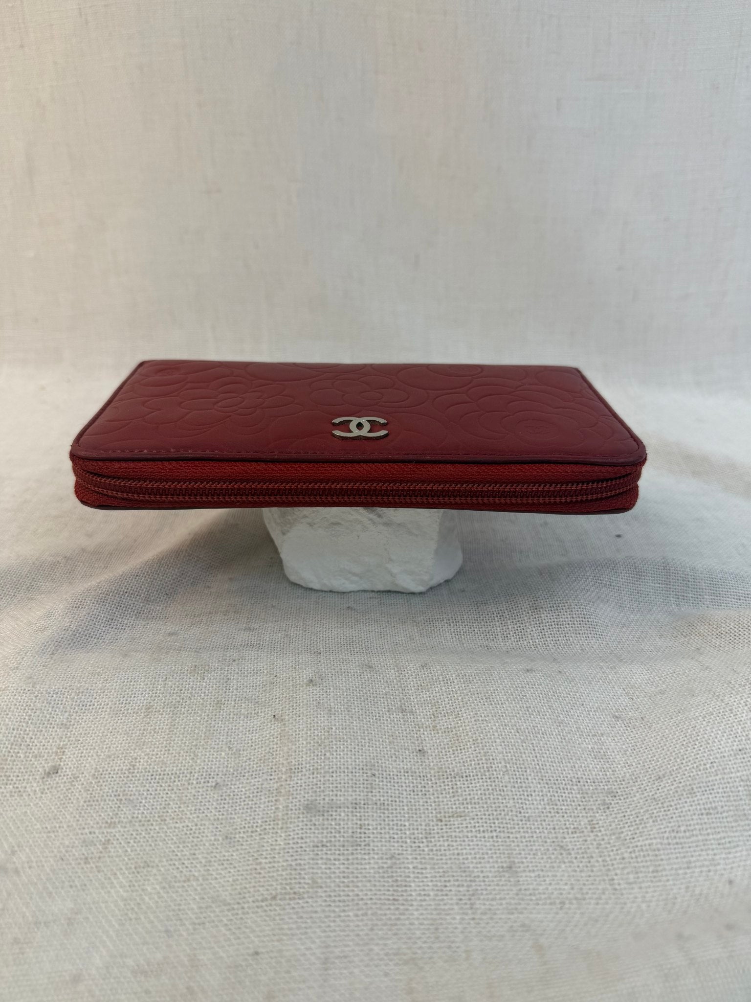 Chanel Red Lambskin Camellia Embossed Zippy Wallet