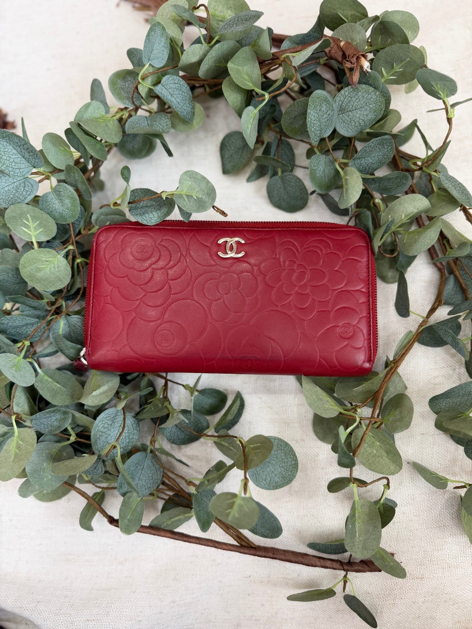 Chanel Red Lambskin Camellia Embossed Zippy Wallet