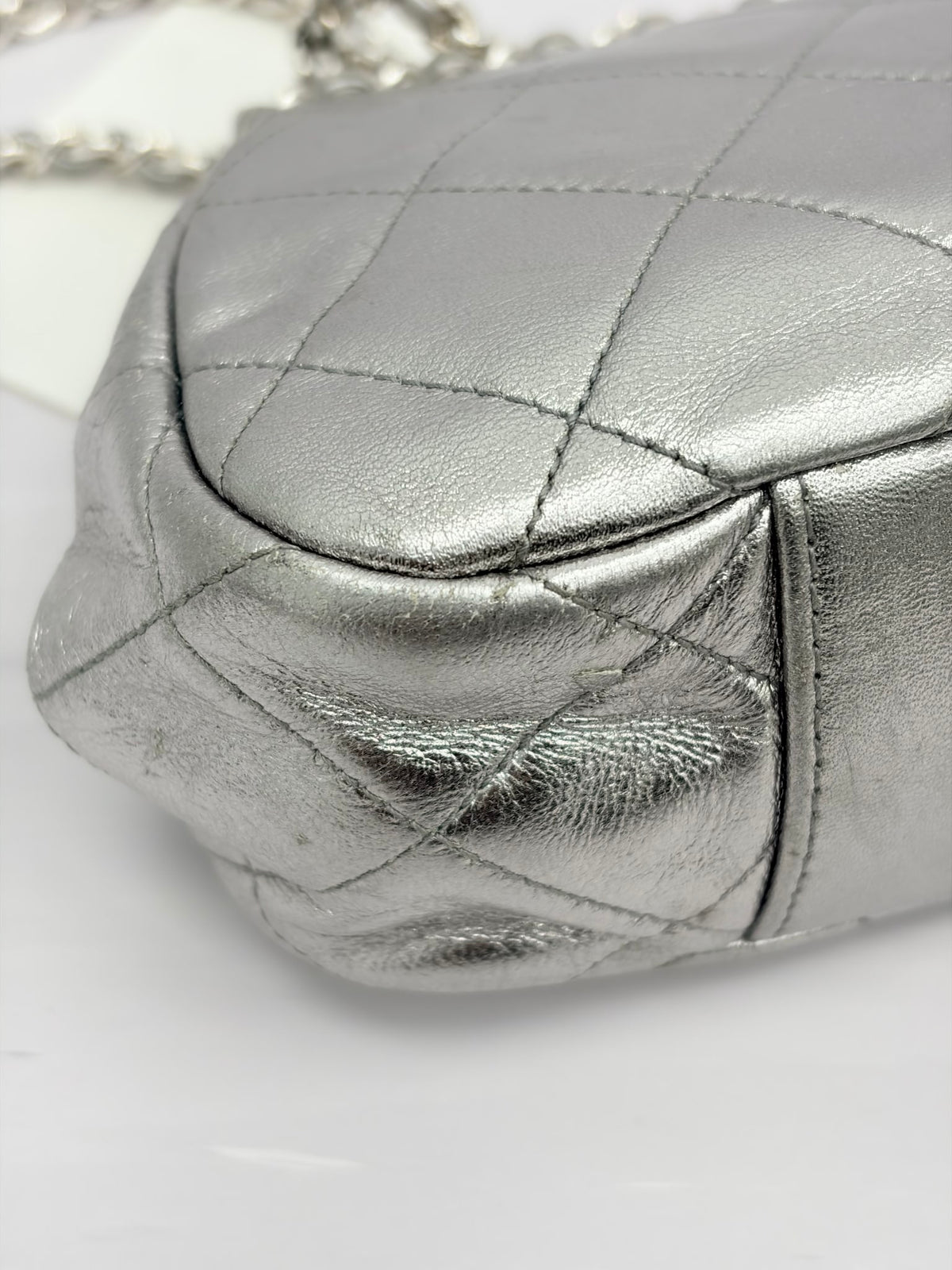 Chanel Metallic Silver Quilted Lambskin Kisslock Frame Bag