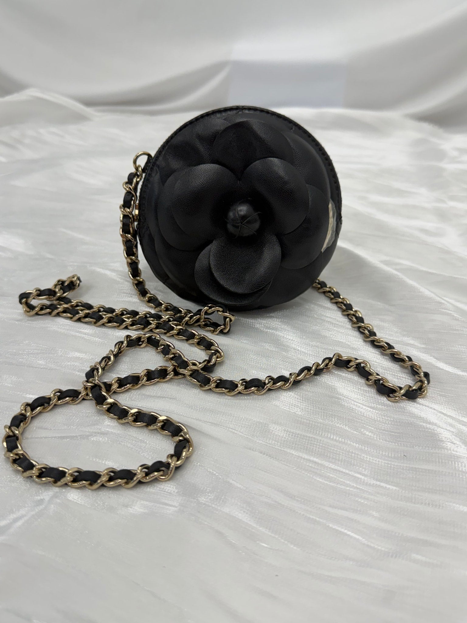 LIKE NEW- Chanel Black Lambskin Round Camellia Clutch on a Chain