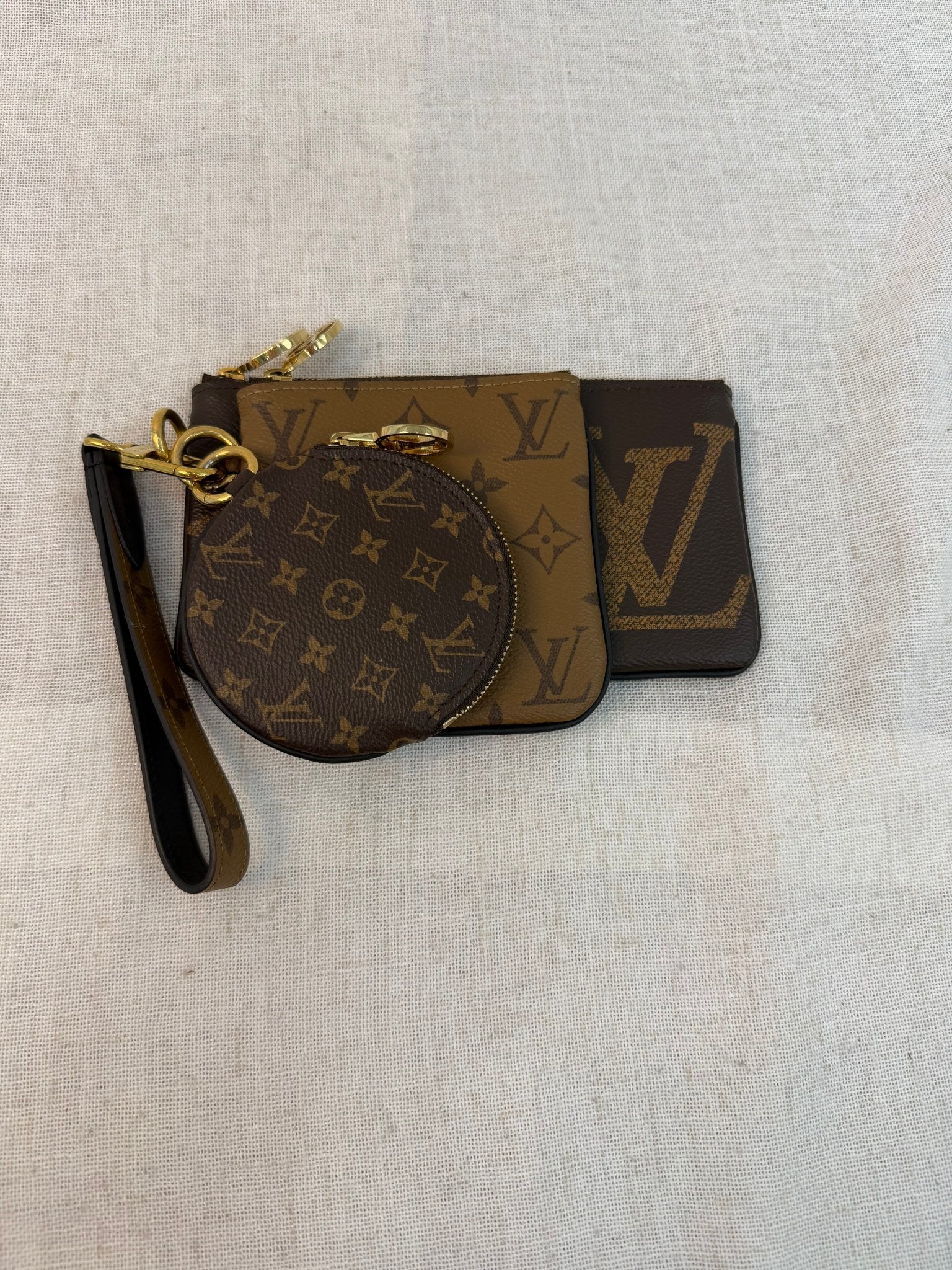 Louis Vuitton Reverise Monogram Trio Pouch Set