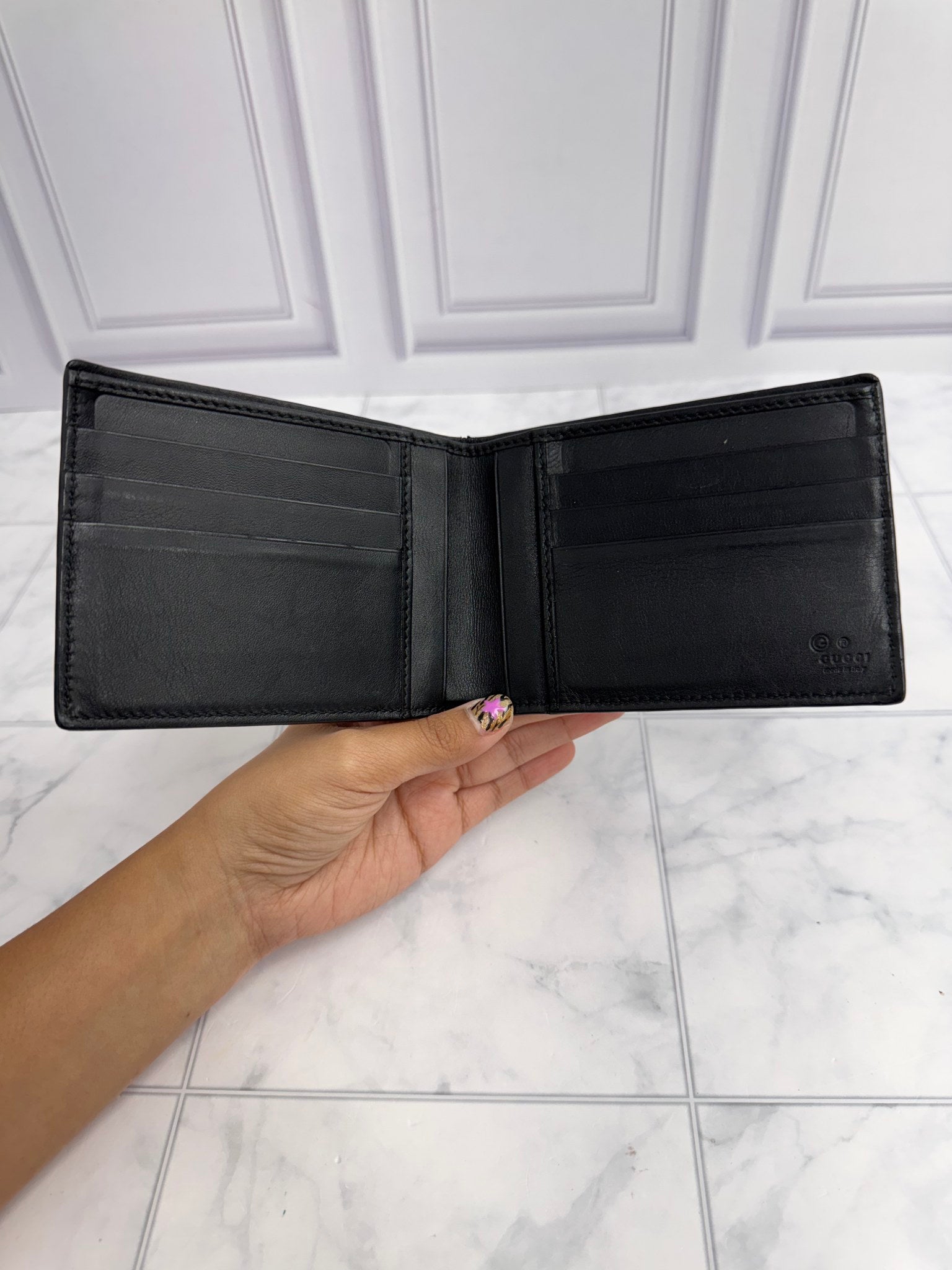 LIKE NEW - Gucci Black Microguccissima Embossed Bi Fold Wallet