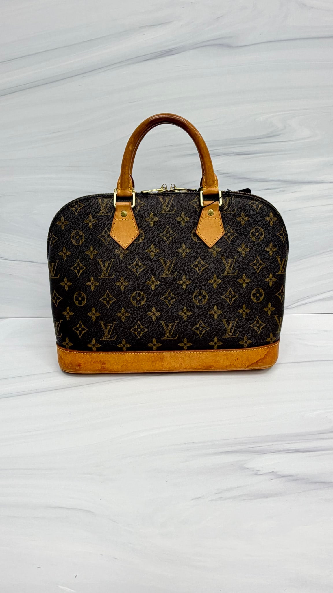 Louis Vuitton Monogram Alma PM Handbag