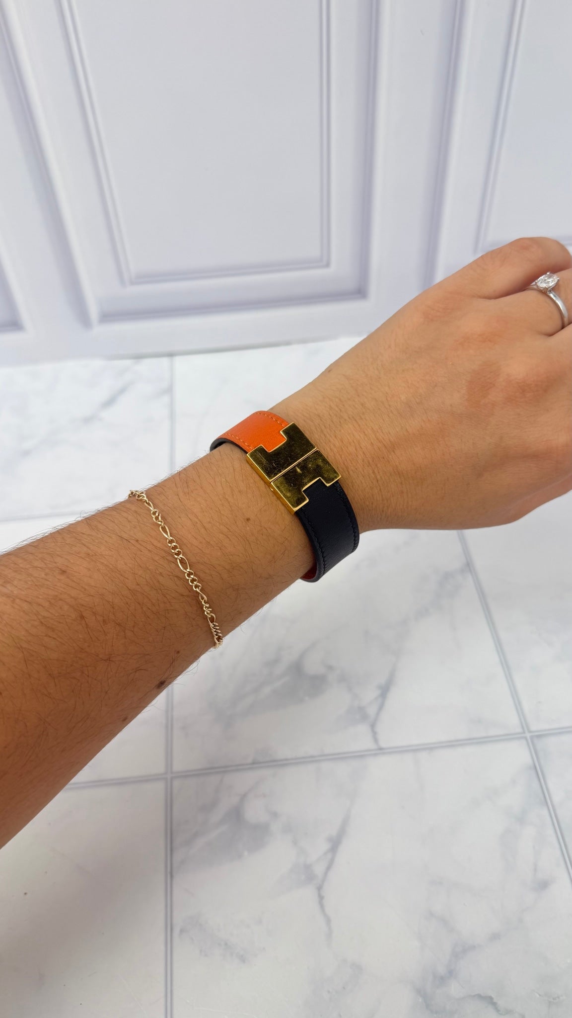 Hermes Black And Orange Leather Lurie Reversible Bracelet