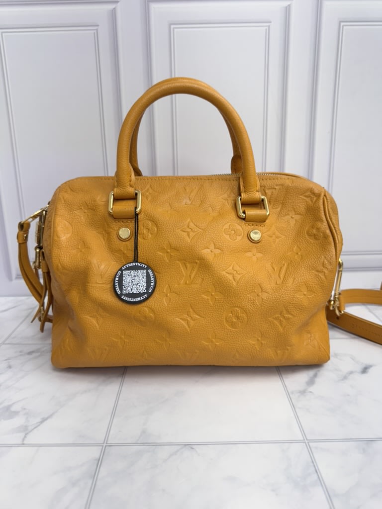 Louis Vuitton Safran Yellow Monogram Empreinte Speedy Bandouliere 25