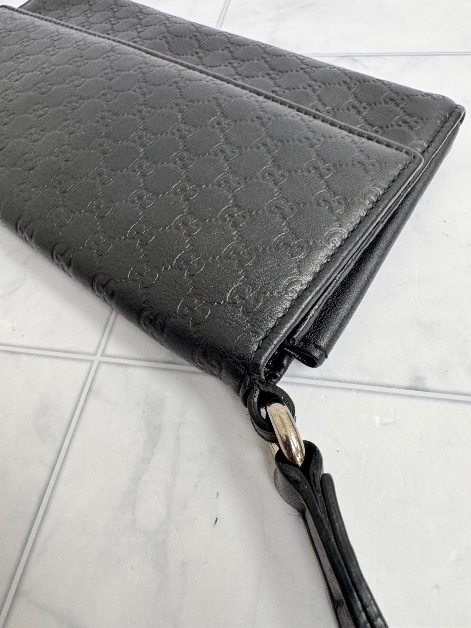 Gucci Black Microguccissima Embossed Leather Wristlet
