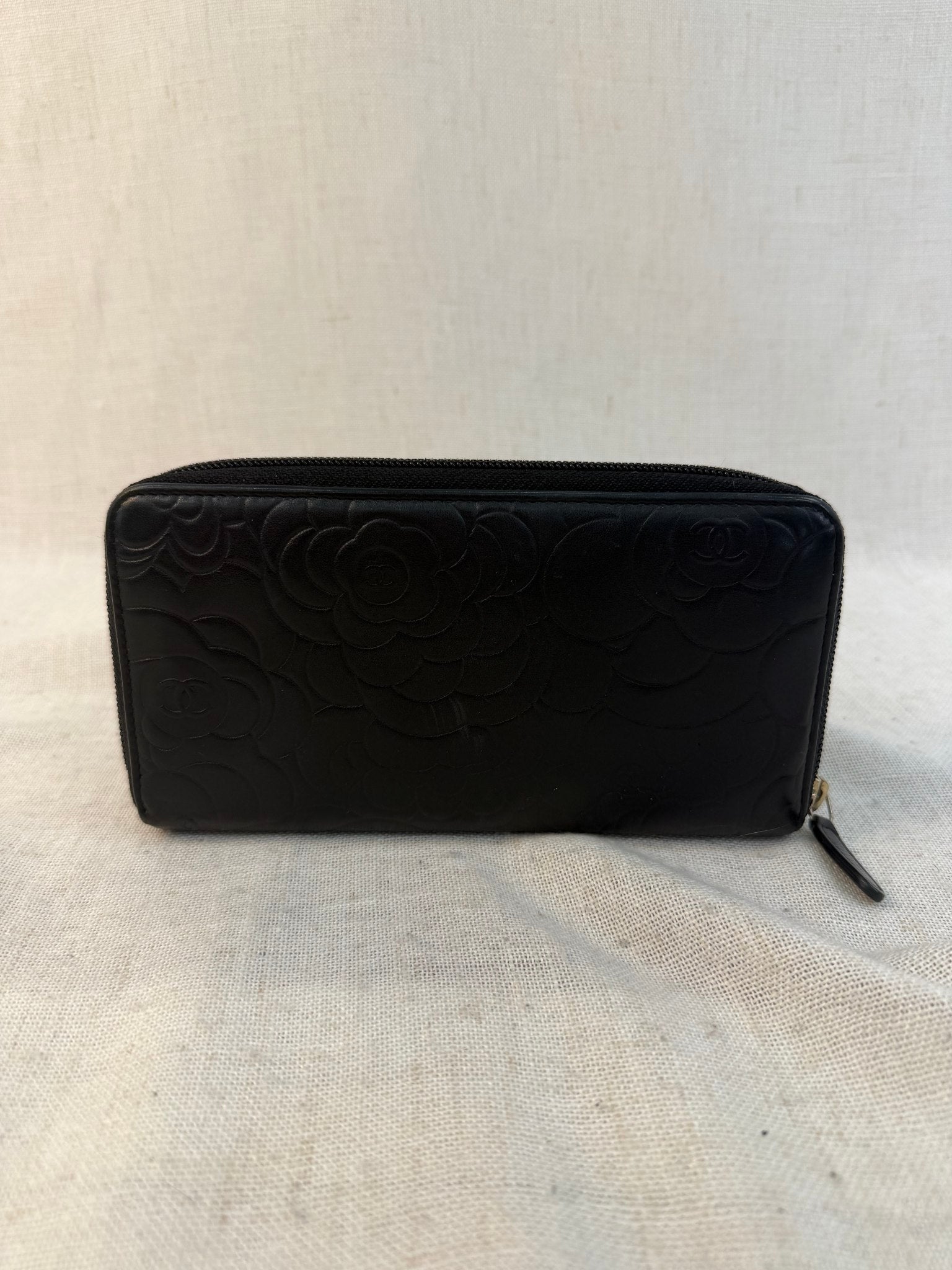 Chanel Black Lambskin Camellia Embossed Zippy Wallet