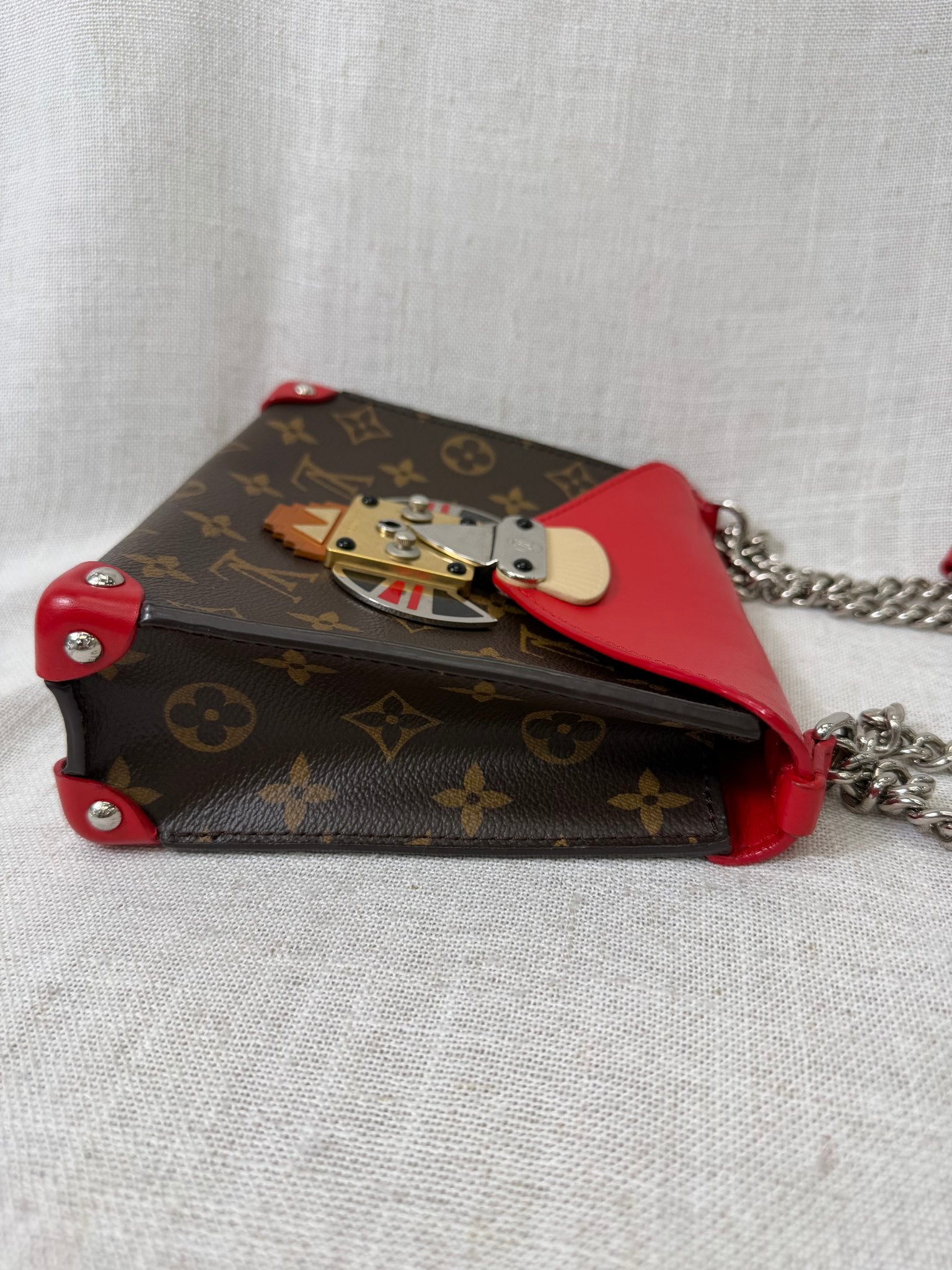 Louis Vuitton Rouge Limited Edition Tribal Mask Pochette Crossbody