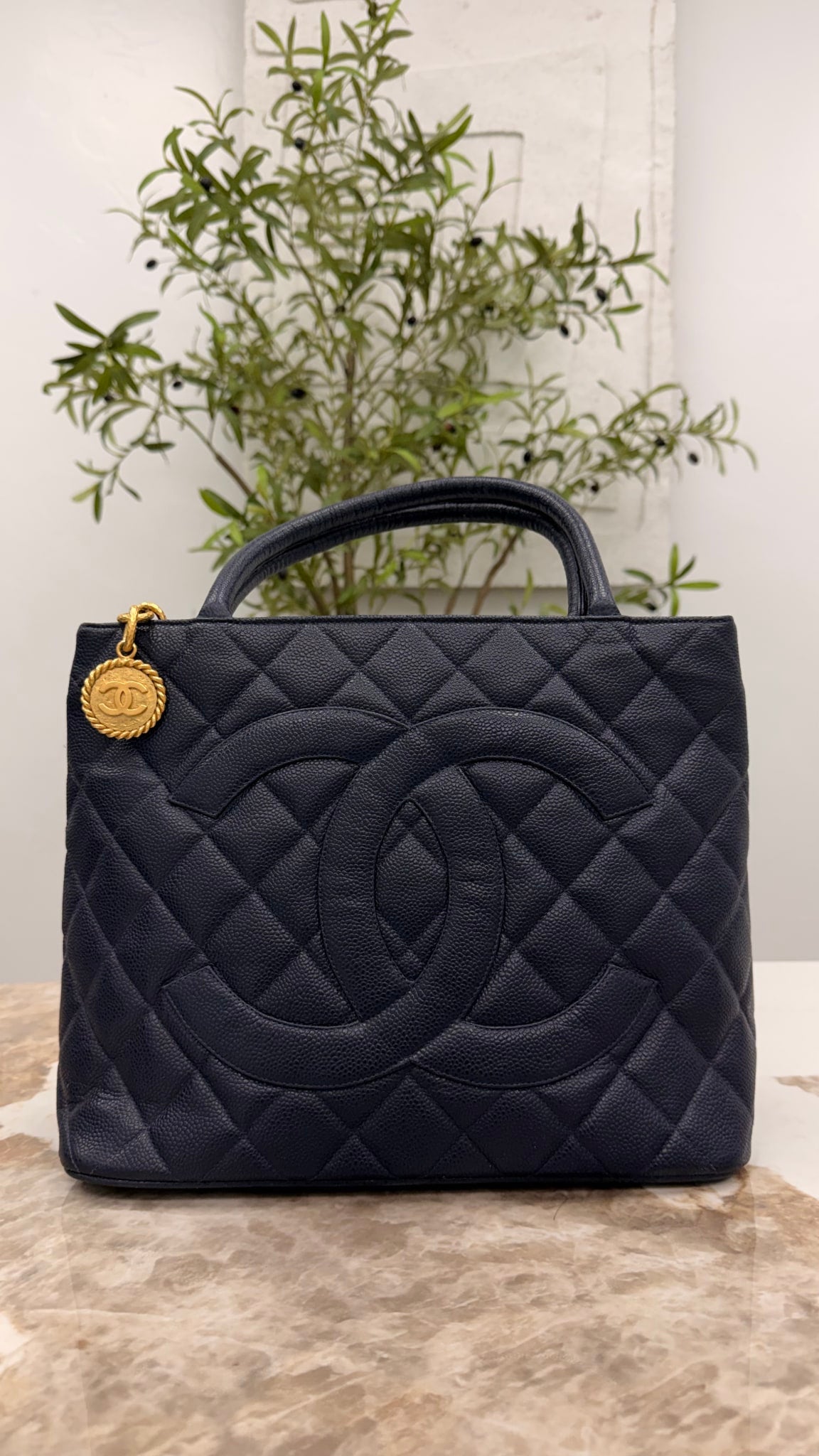 Chanel Navy Quilted Caviar Leather Medallion Tote Bag