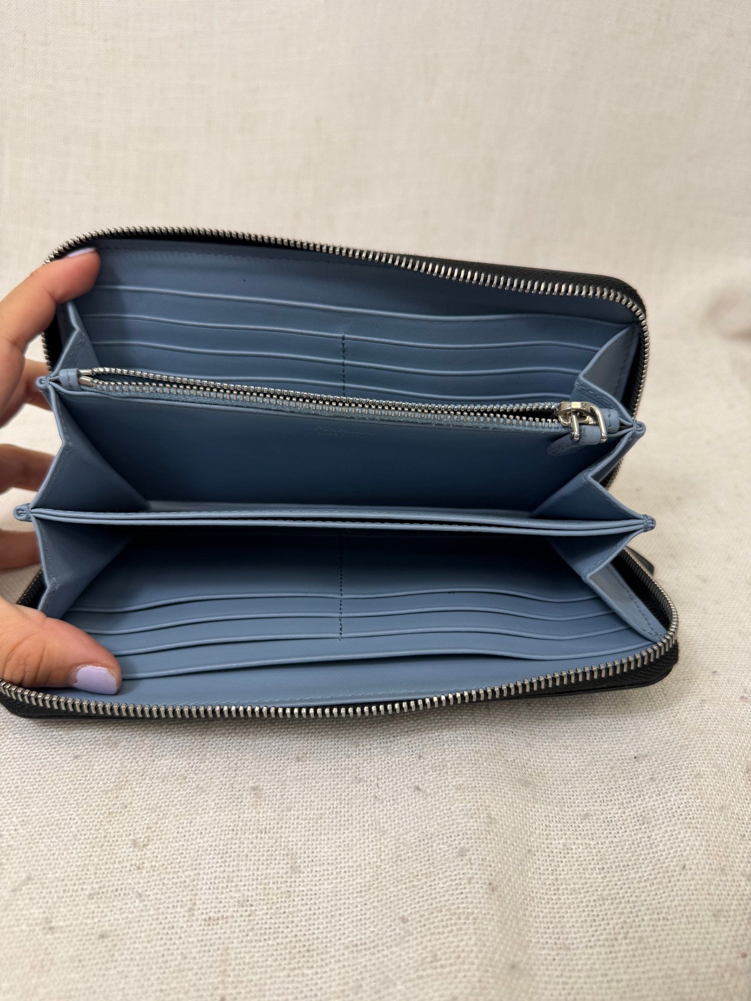 Prada Black Leather Zippy Wallet