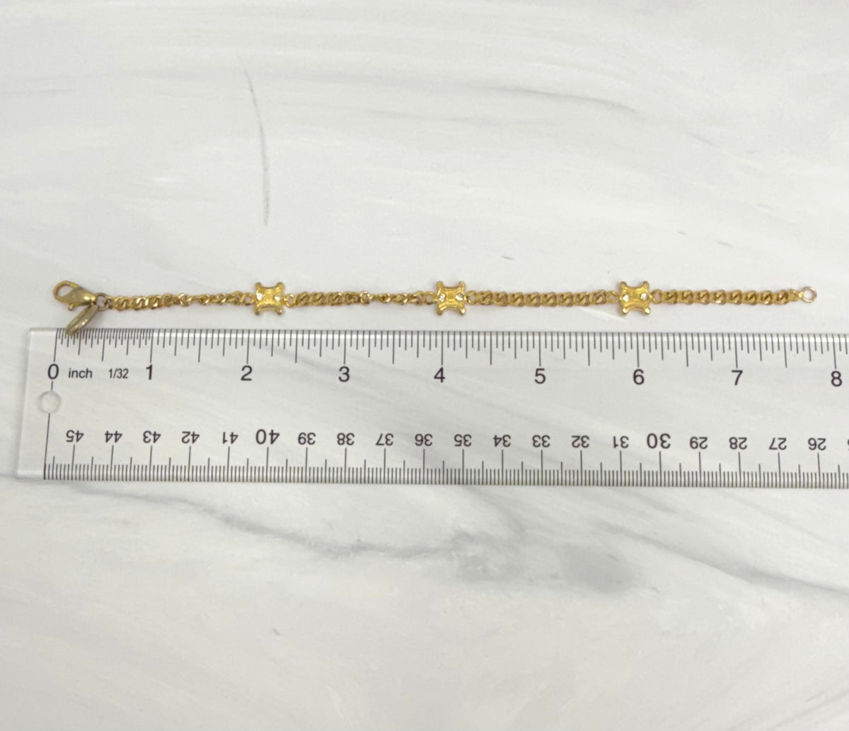 Celine Gold Tone Triomphe Rhinestone Curb Link Bracelet