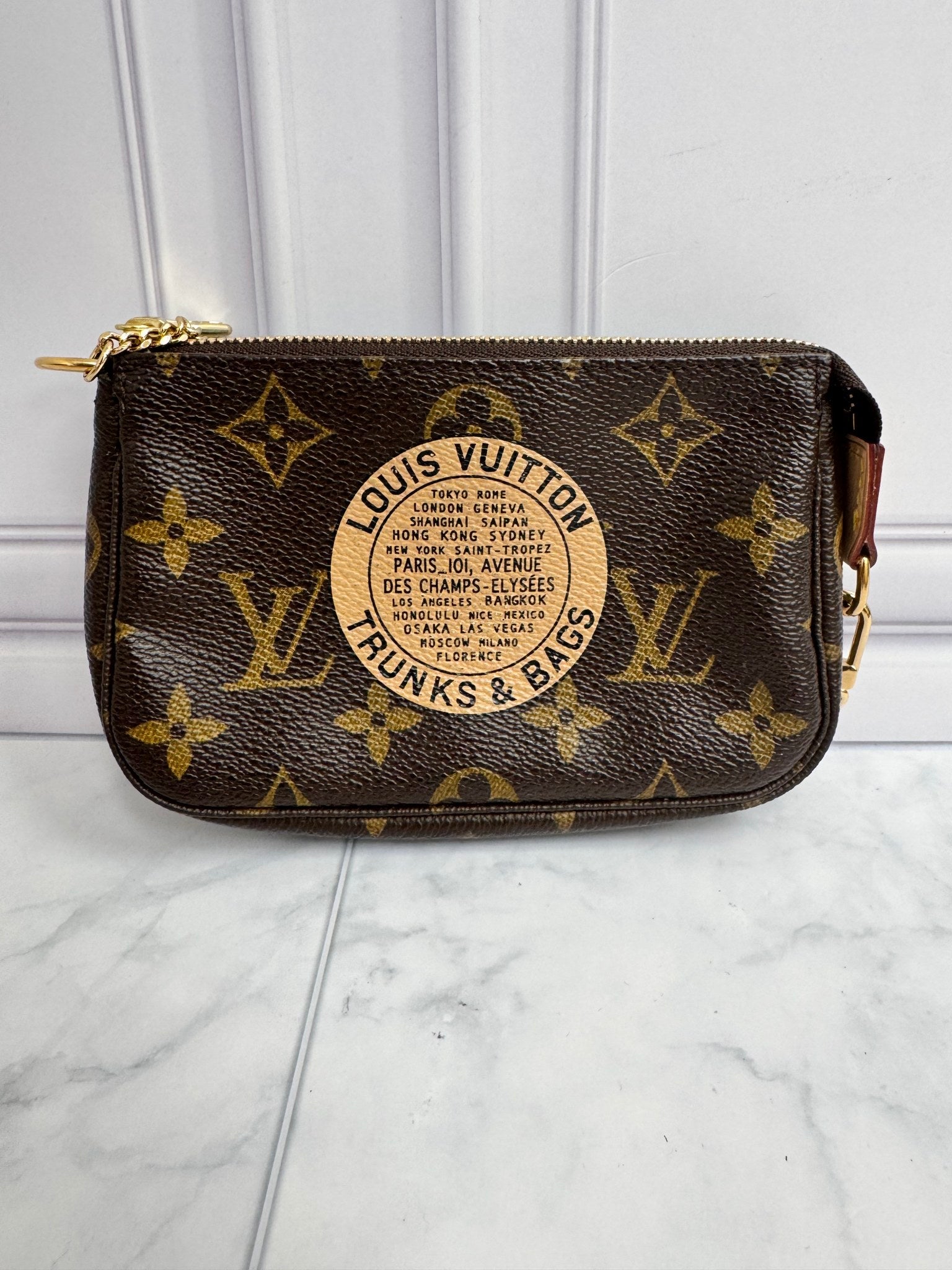 Louis Vuitton Monogram Limited Edition “Trunks & Bags” Mini Pochette