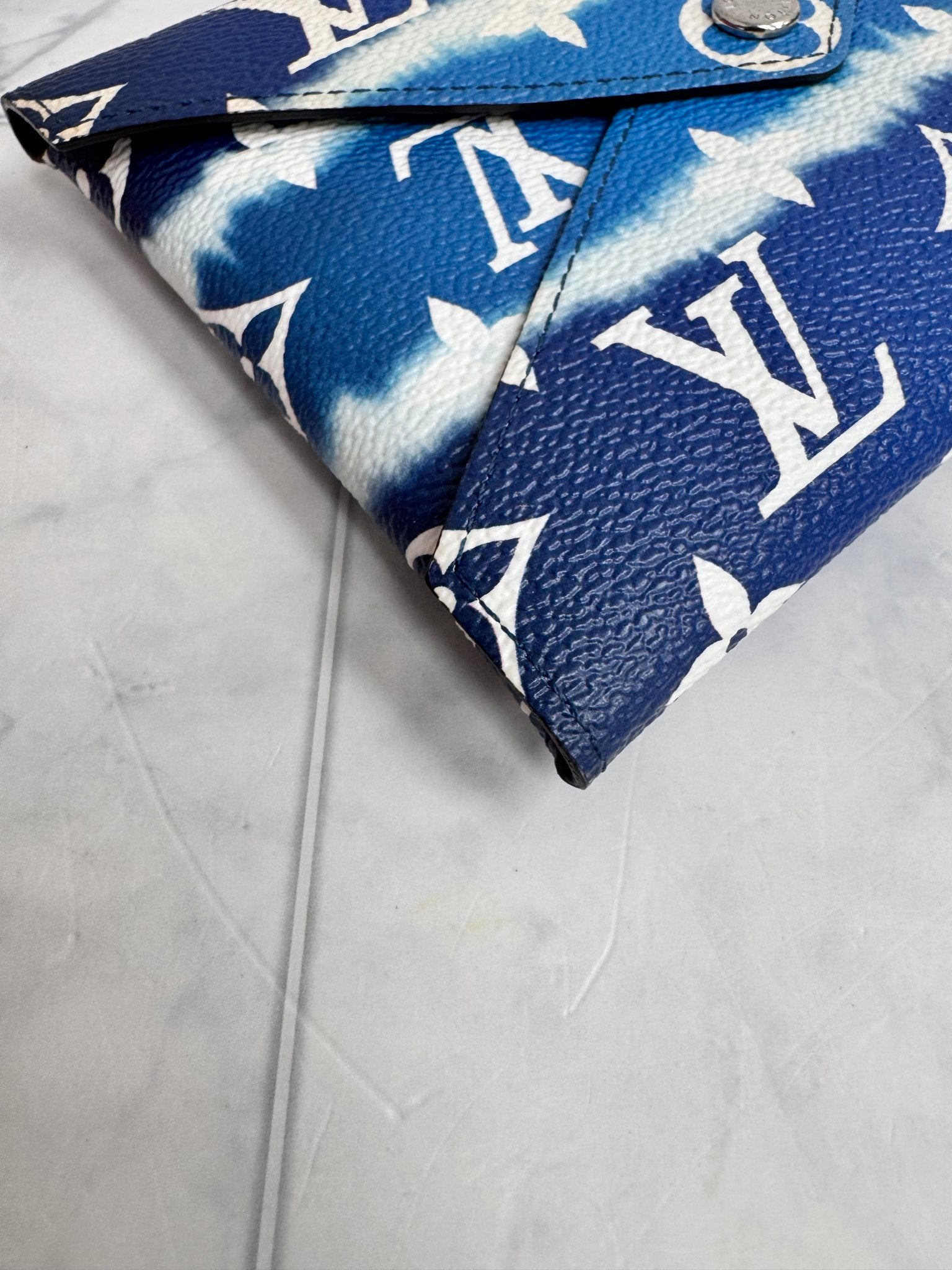 Louis Vuitton Blue Monogram Escale Medium Kirigami Pochette