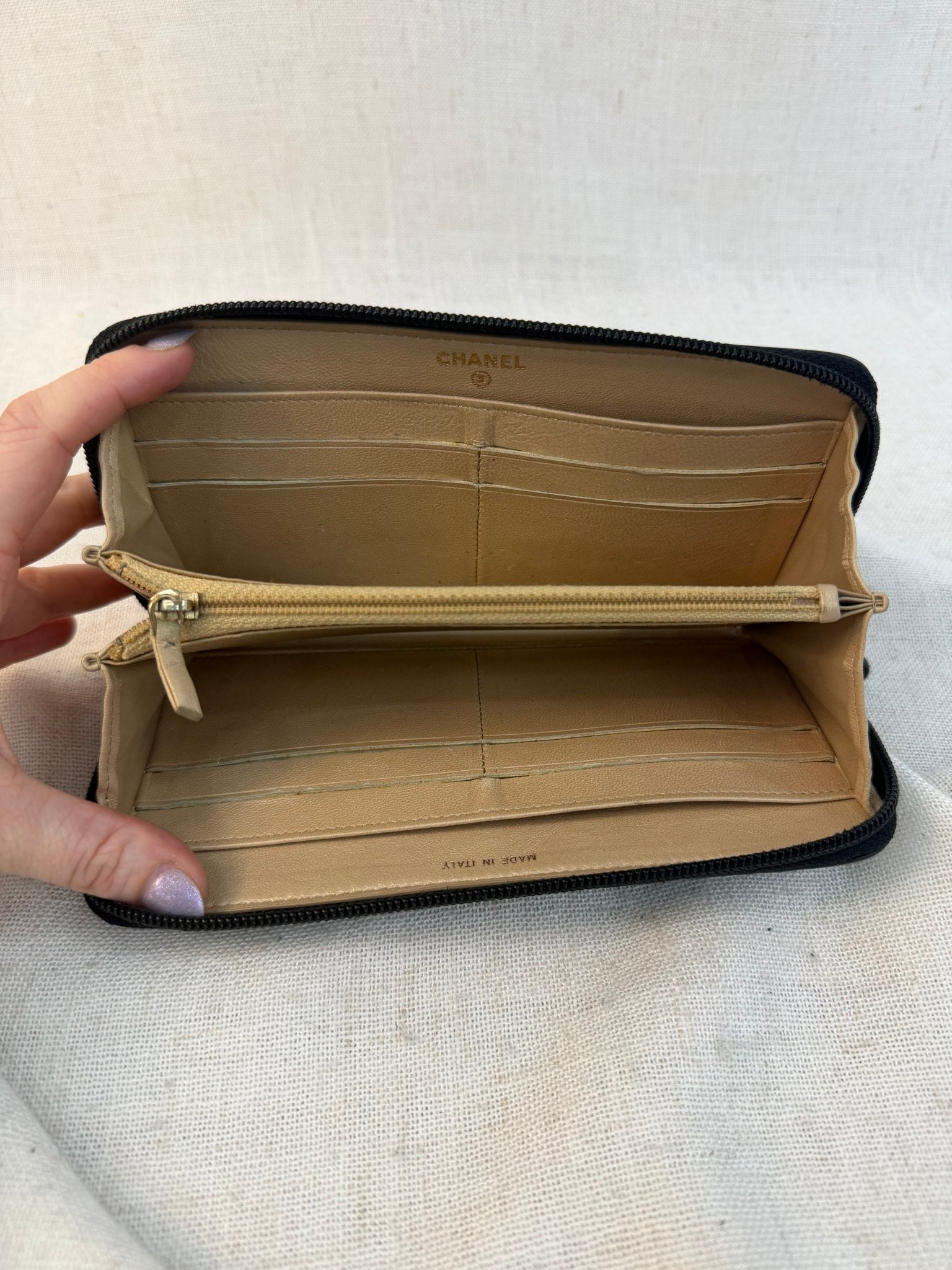 Chanel Black Lambskin Camellia Embossed Zippy Wallet