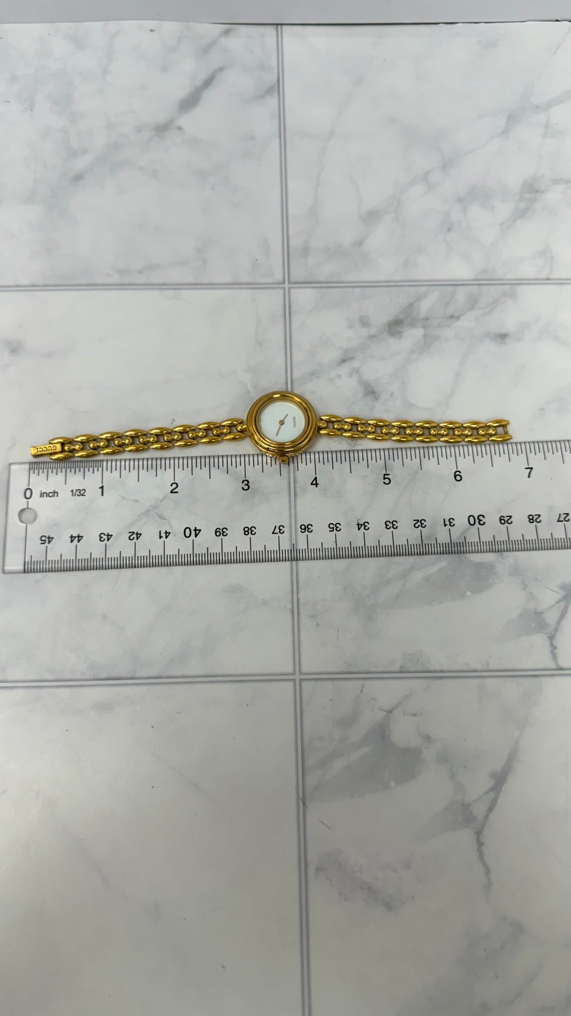 Gucci Gold Toned Interchangeable Bezel Watch With Extra Bezels 26MM