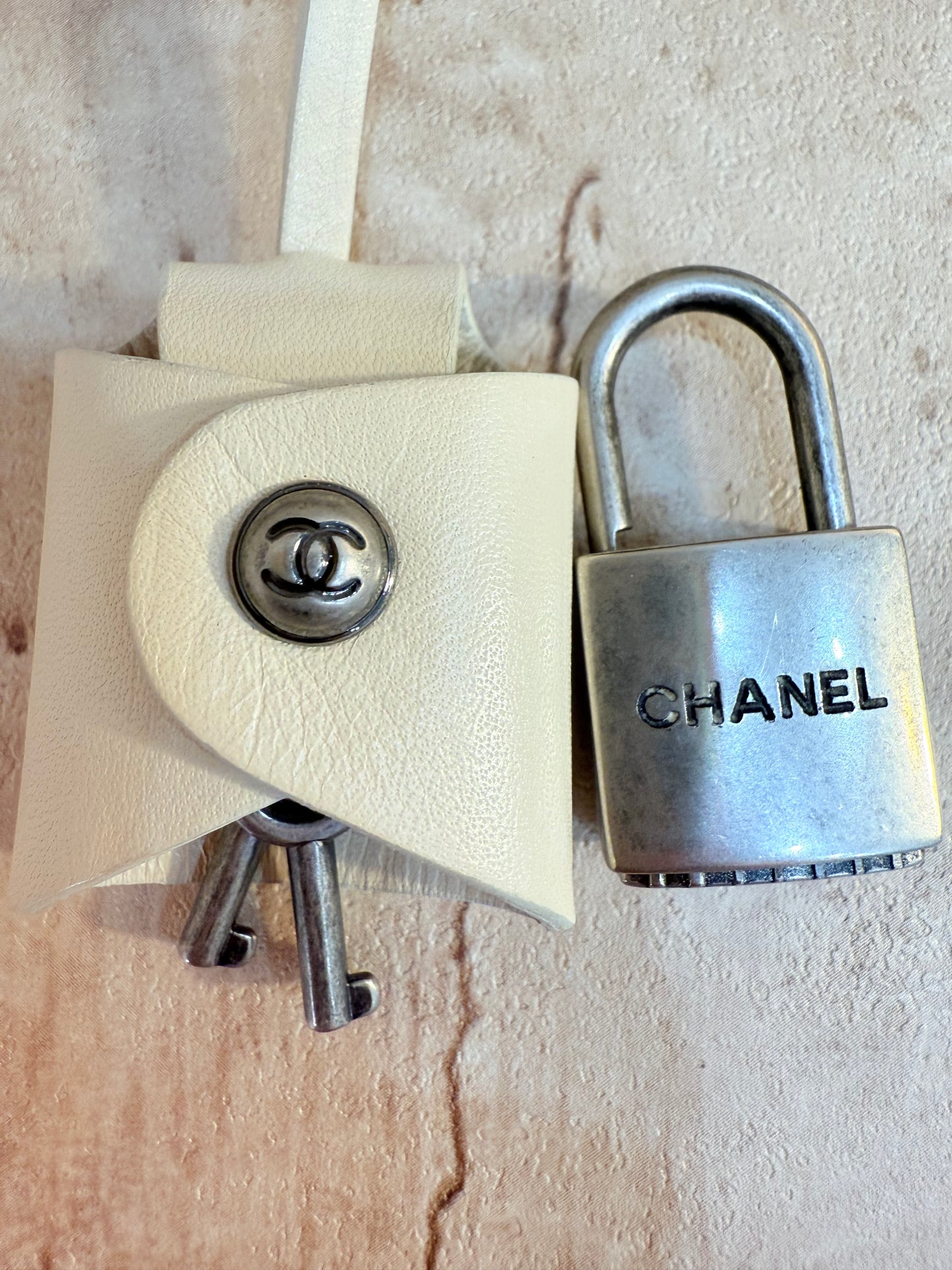 Chanel Ivory Paris NYC Rolling Luggage