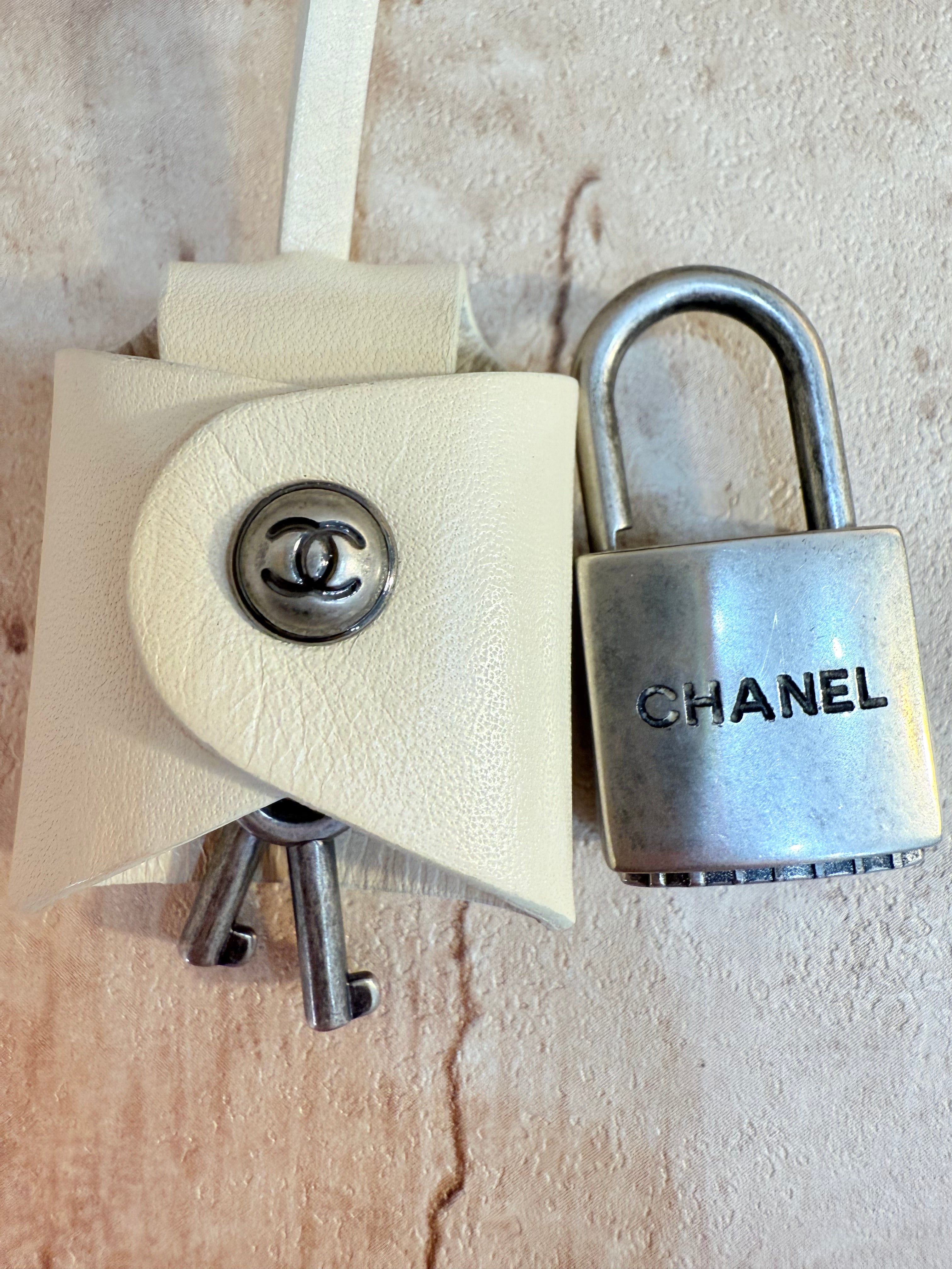 Chanel Ivory Paris NYC Rolling Luggage