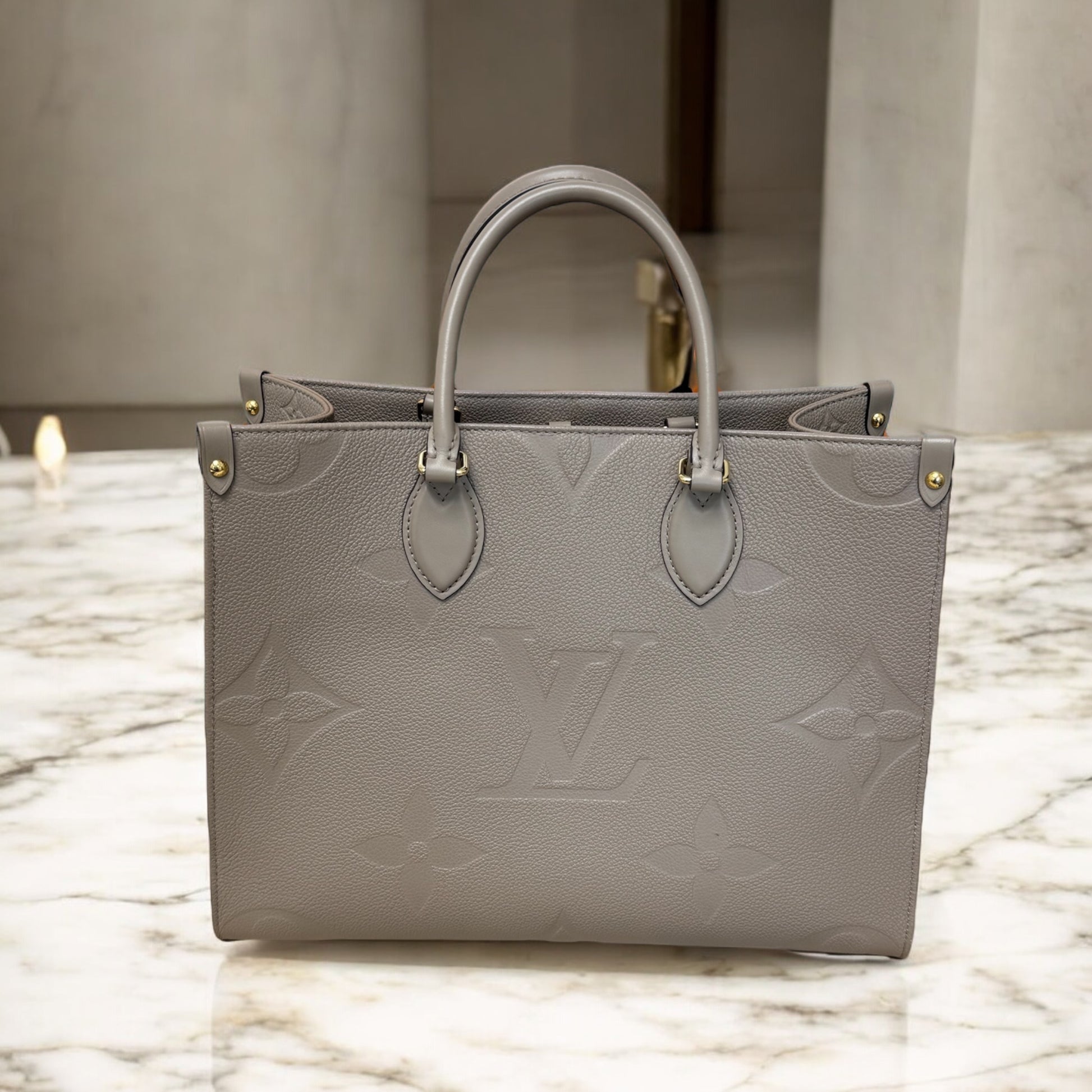 Louis Vuitton Turtledove Empreinte On the Go MM