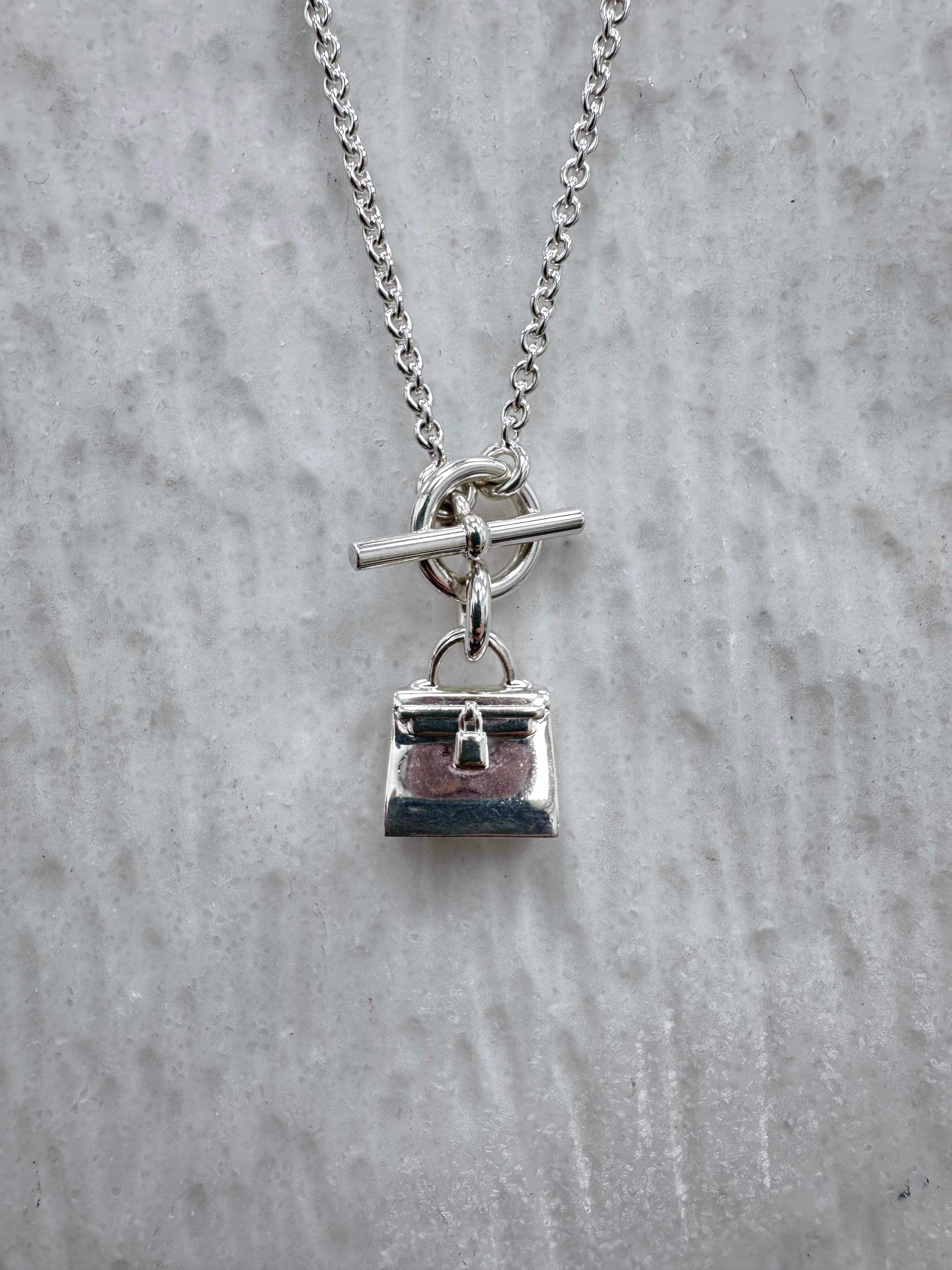 Hermes Sterling Silver Amulettes Kelly Pendant Necklace