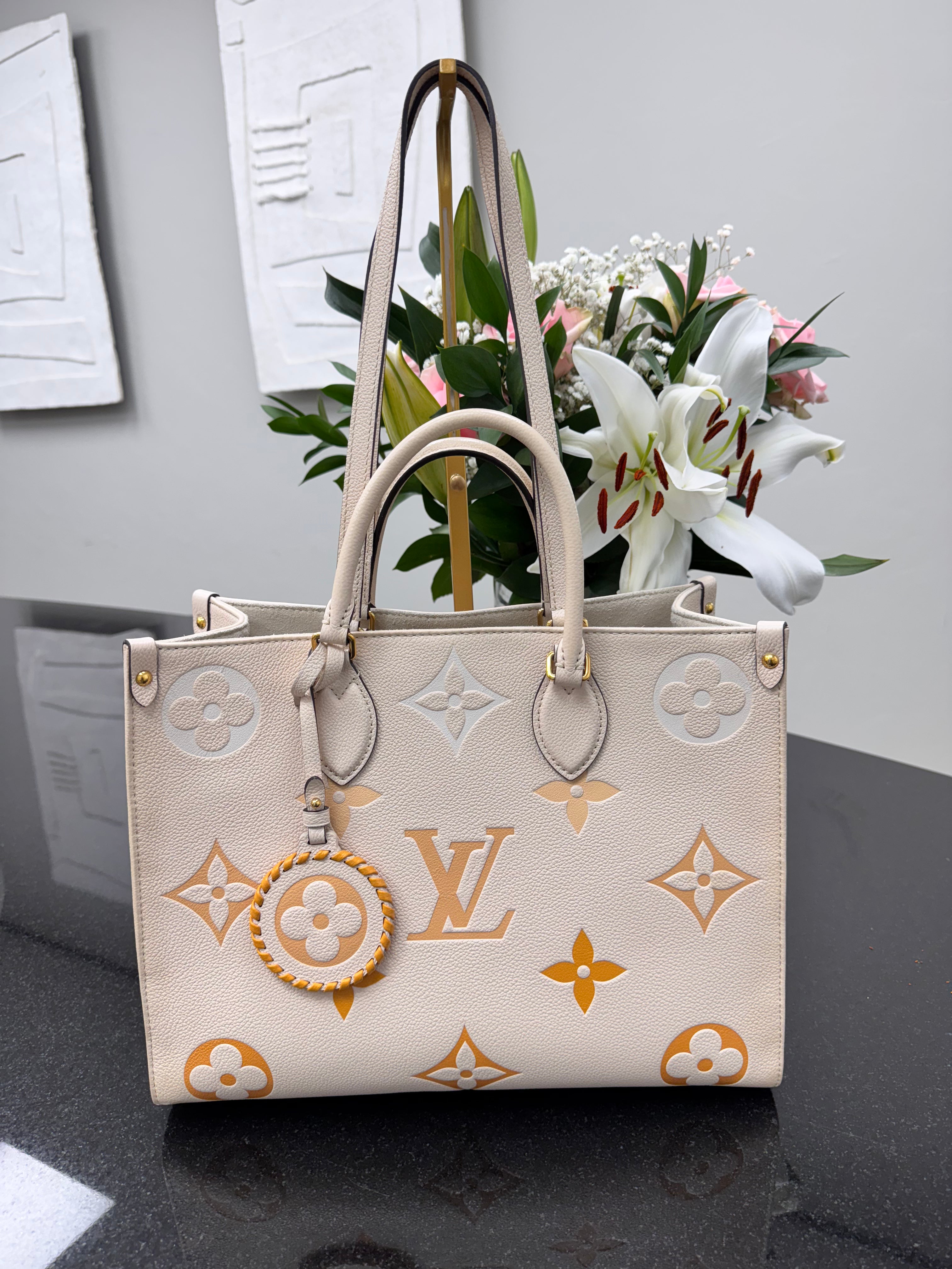 Louis Vuitton Creme Monogram By The Pool On The Go MM