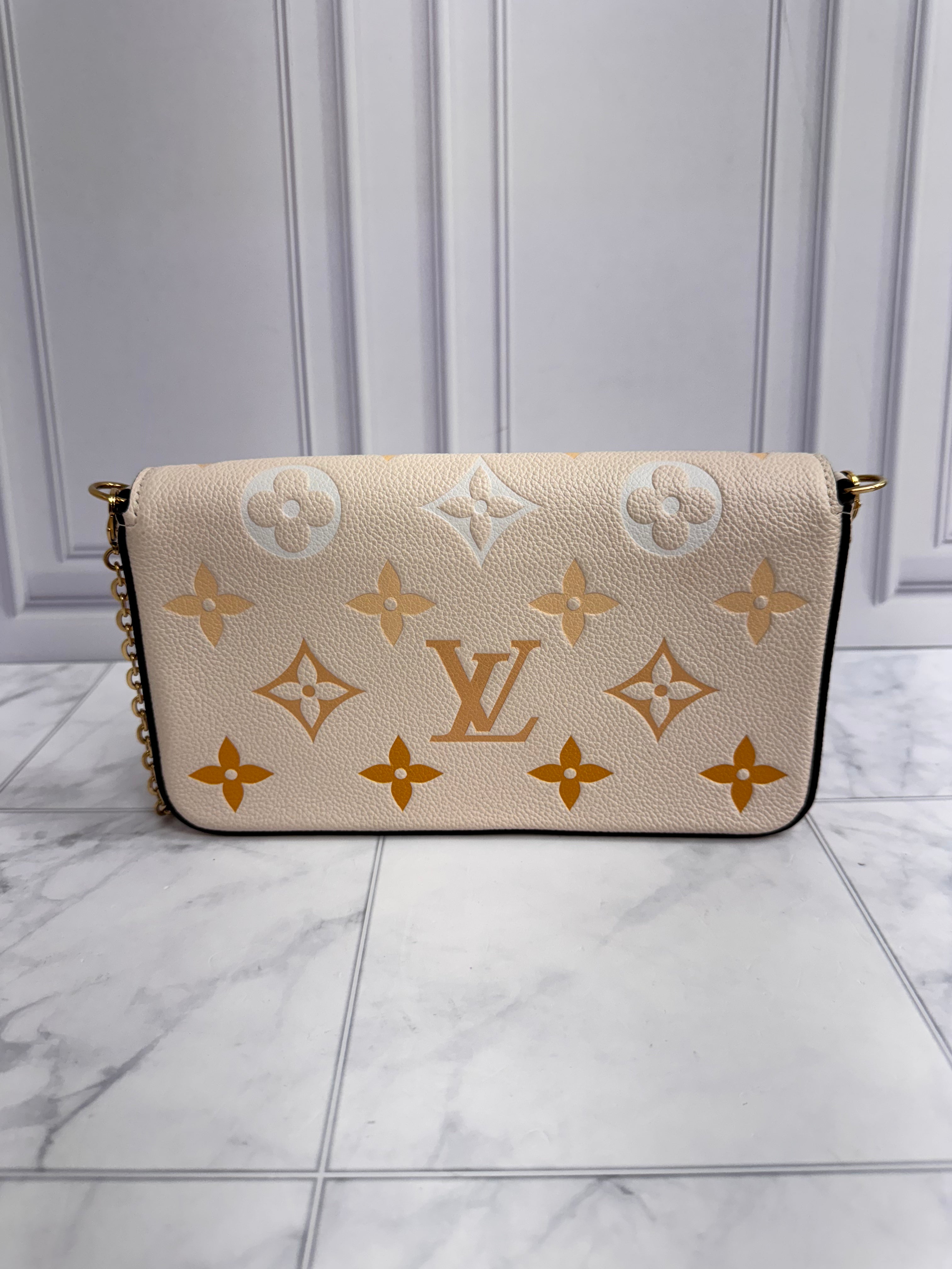 LIKE NEW - Louis Vuitton Beige Monogram Empreinte By The Pool Felicie Pochette