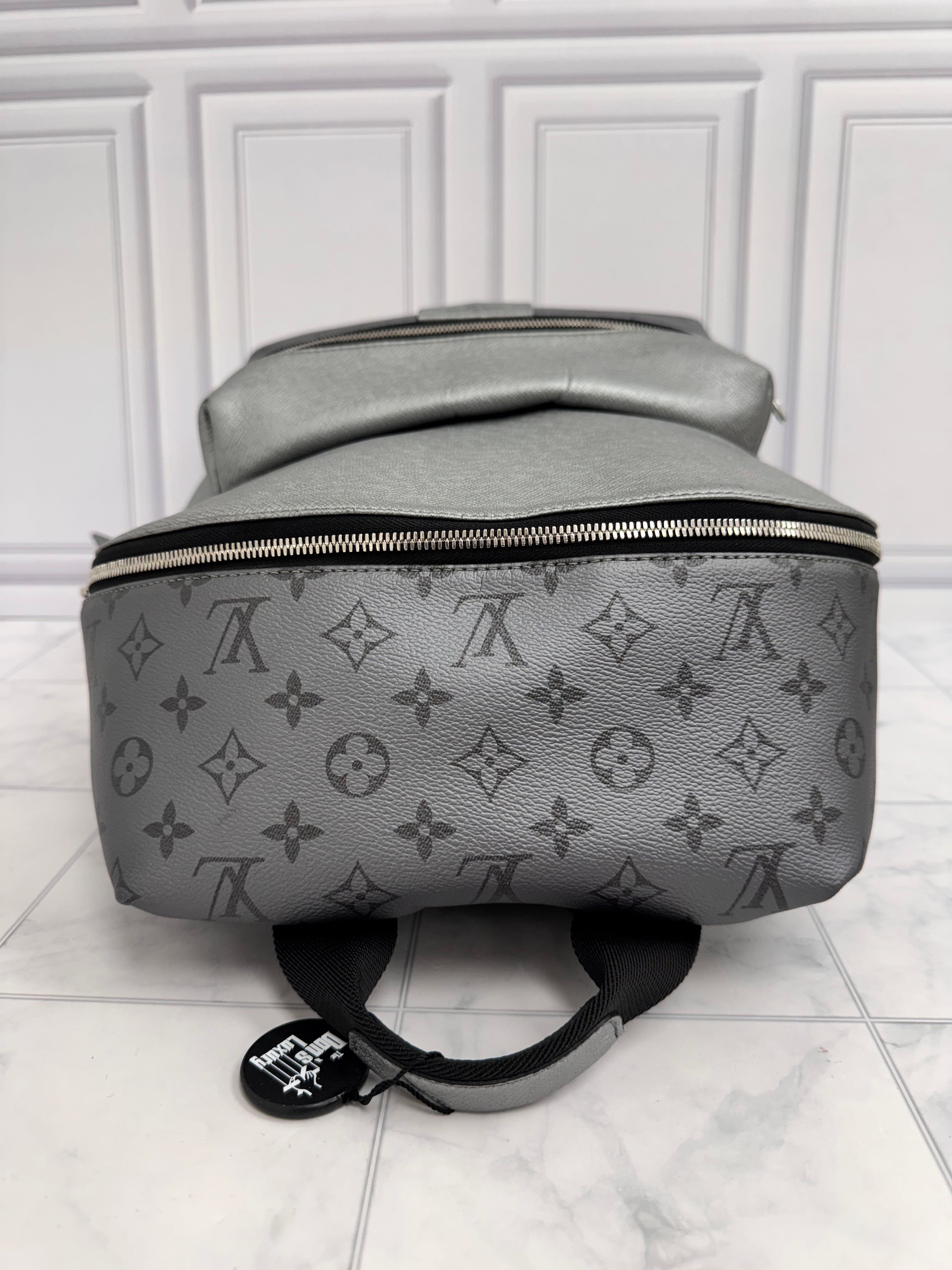 Louis Vuitton Metallic Silver Monogram Taigarama Discovery Backpack PM