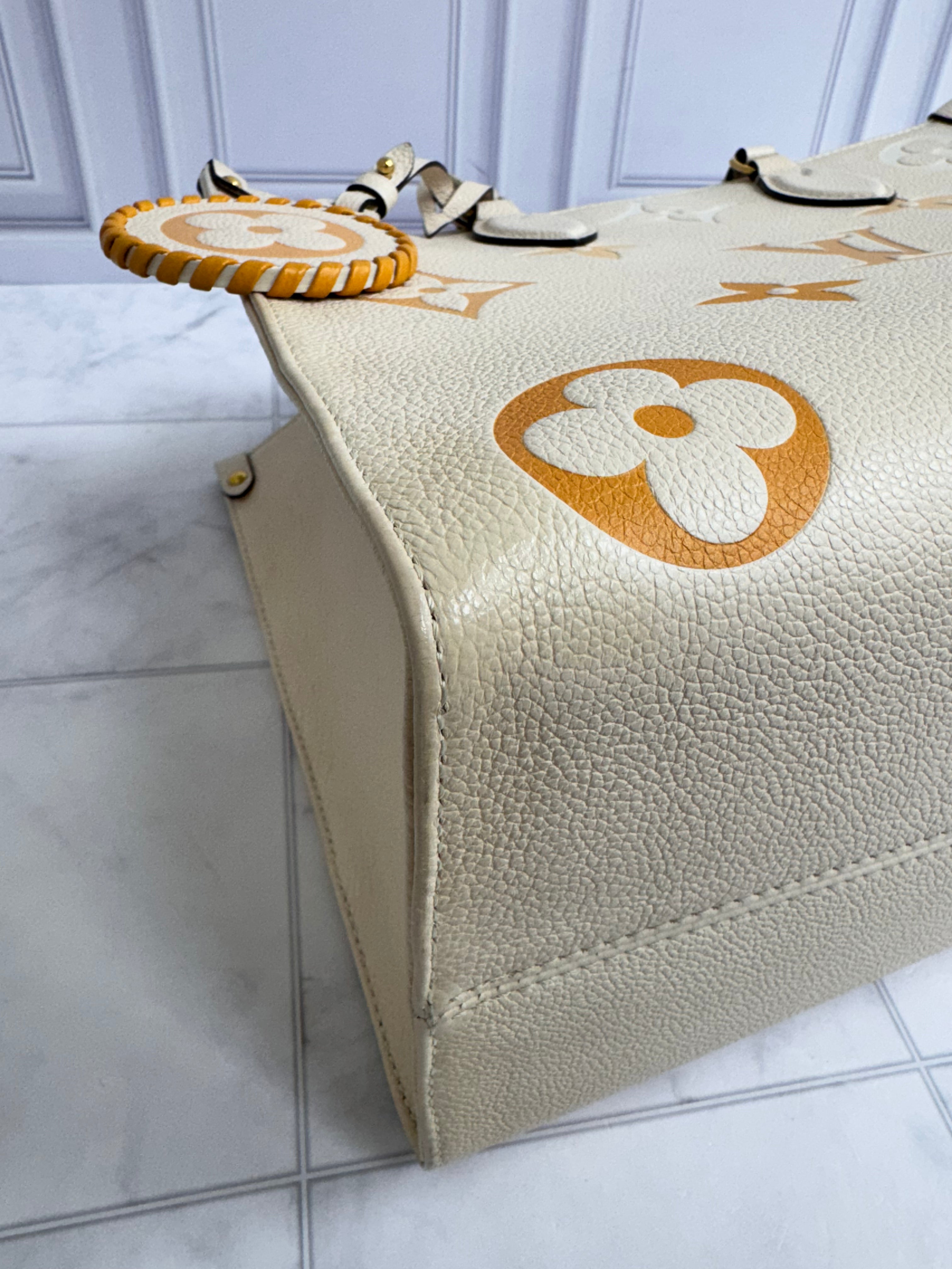 Louis Vuitton Creme Monogram By The Pool On The Go MM
