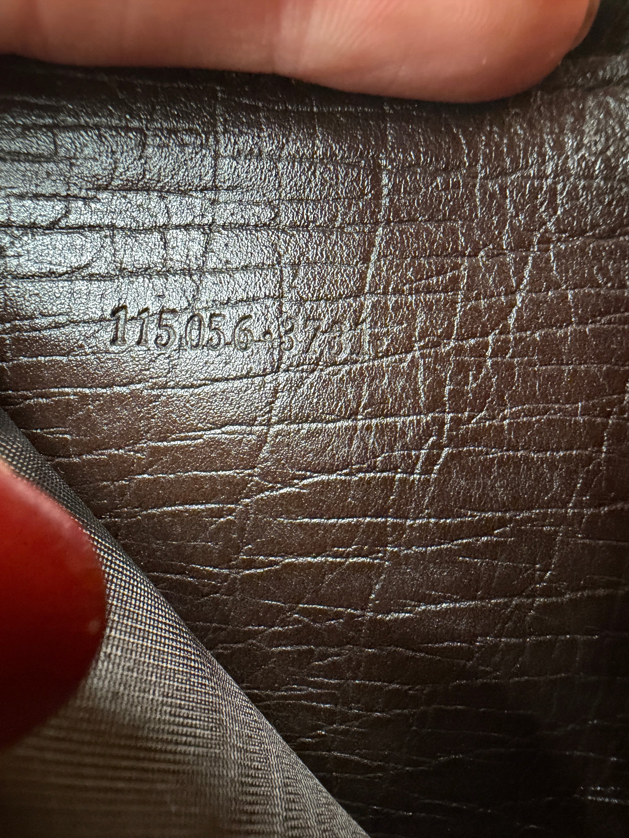 Gucci GG Coated Canvas Zippy Wallet