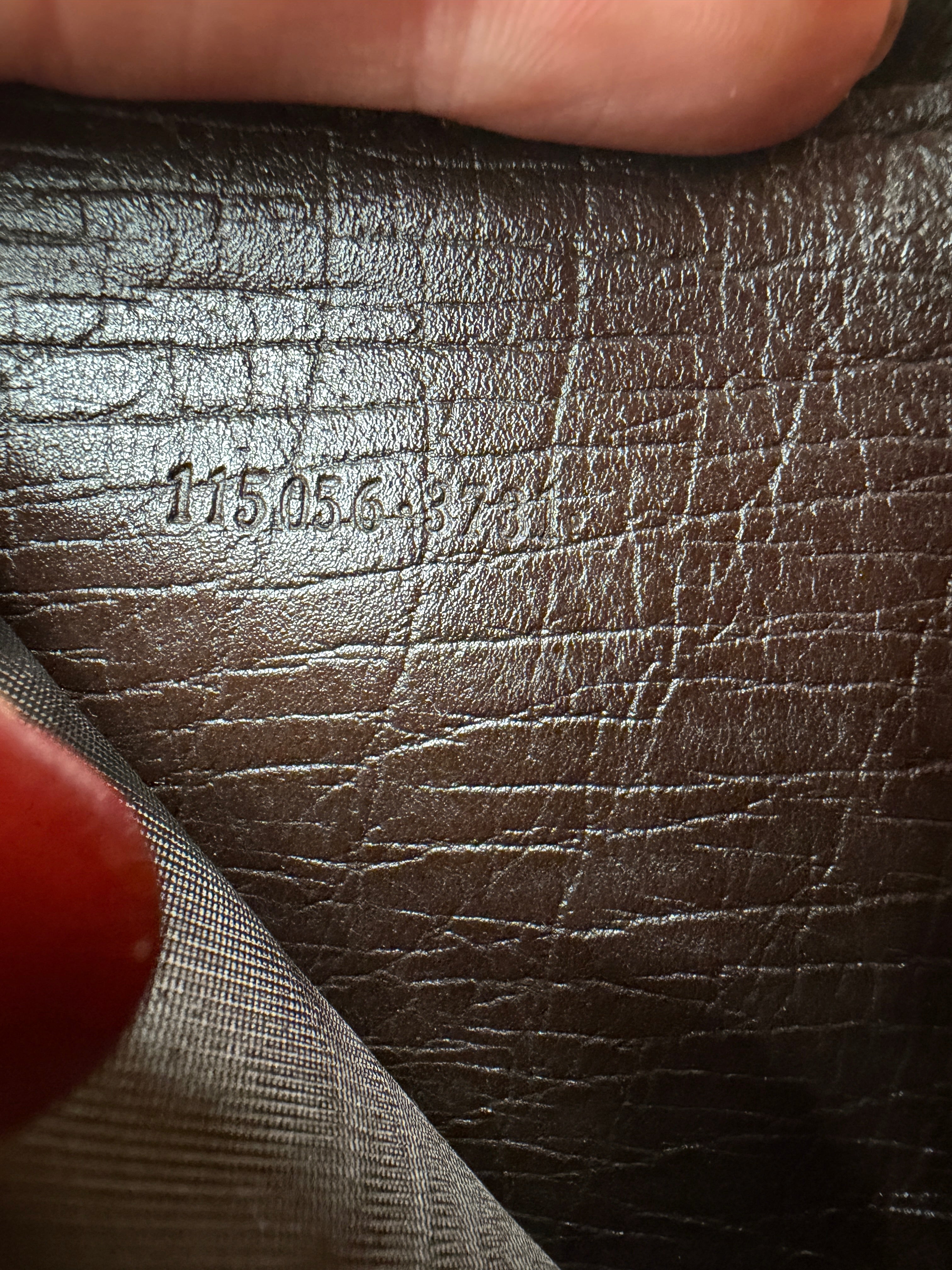 Gucci GG Coated Canvas Zippy Wallet