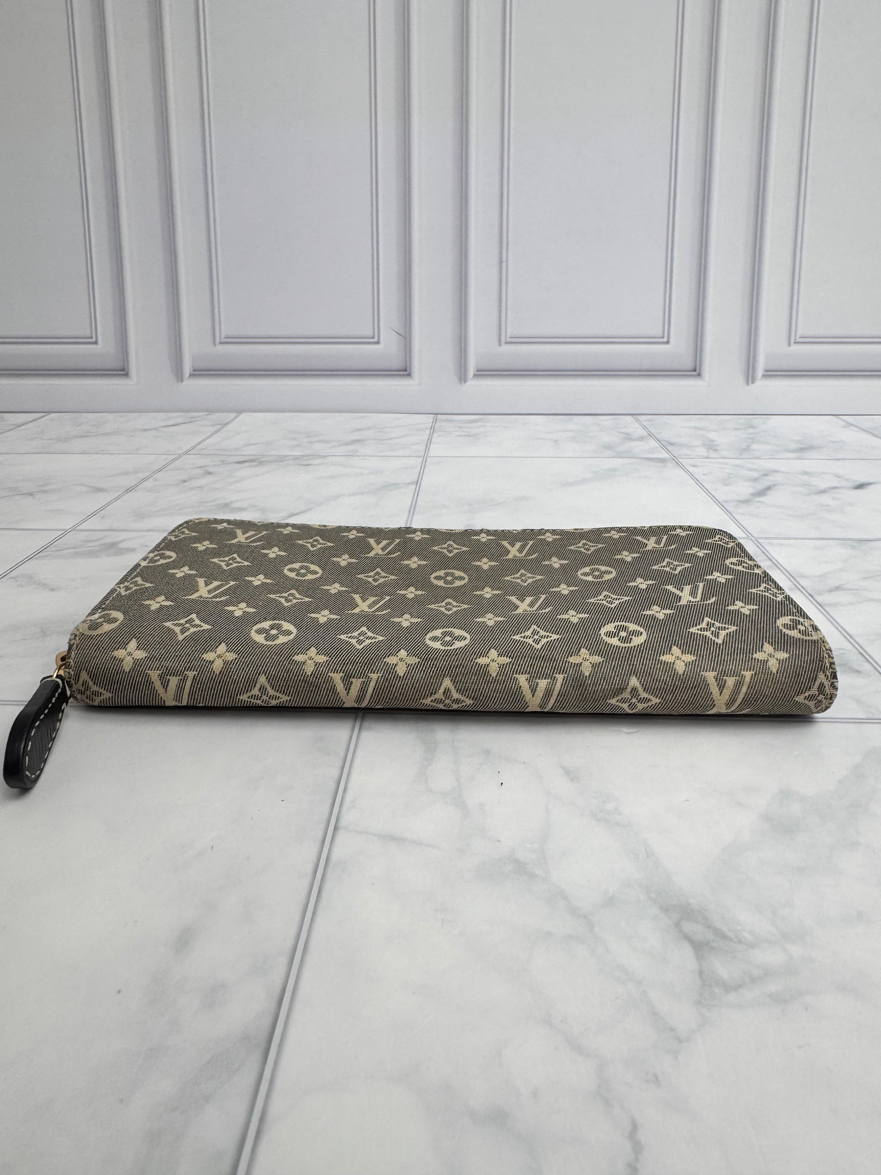 Louis Vuitton Mini Lin Monogram Zippy Wallet