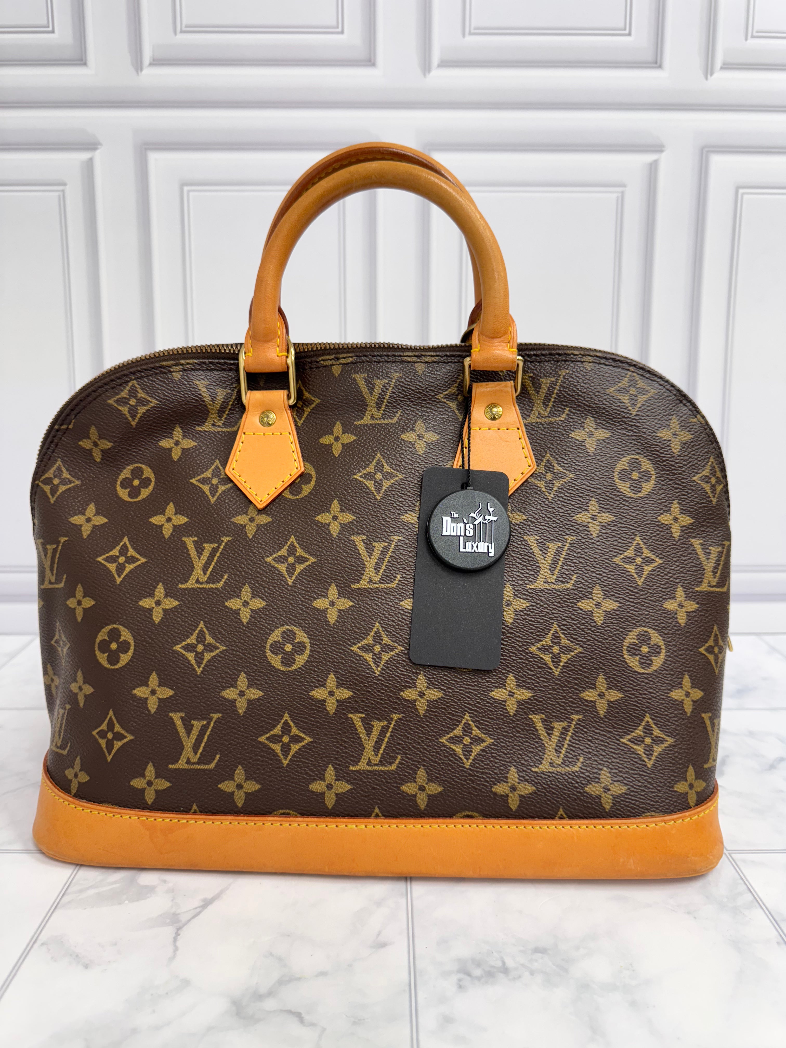 Louis Vuitton Monogram Alma PM Handbag