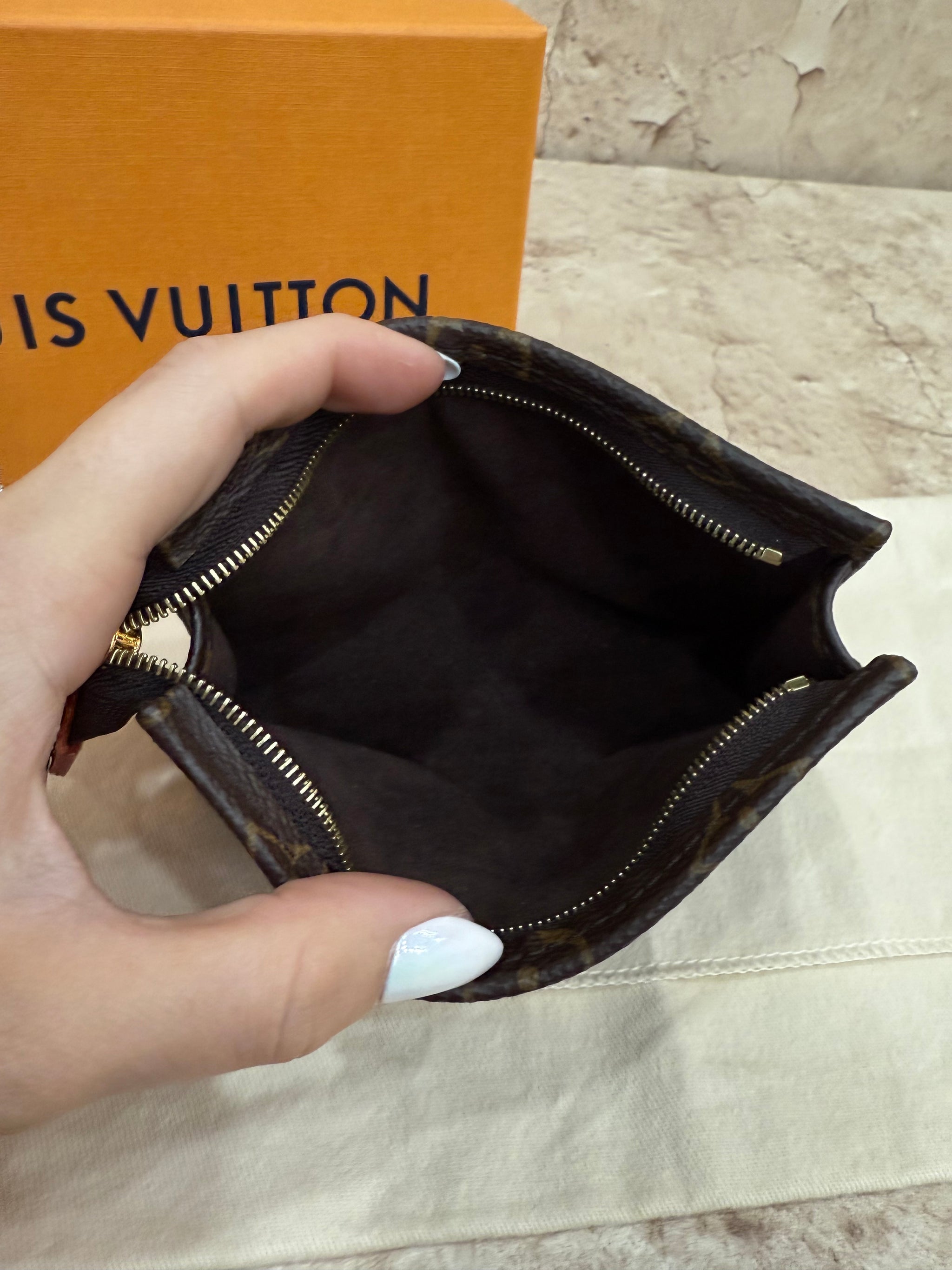 BRAND NEW Louis Vuitton Monogram Mini Toiletries Pouch