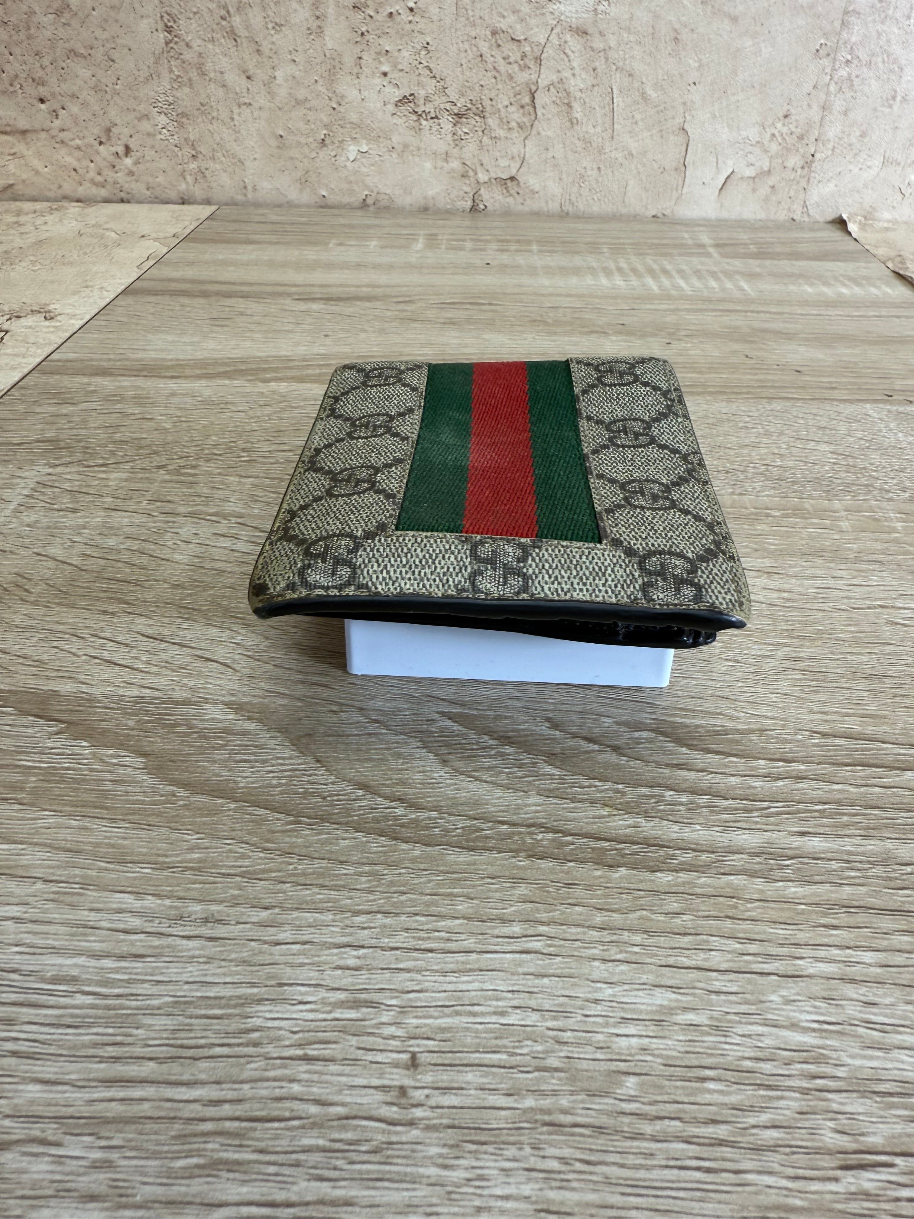 Gucci Brown Canvas GG Supreme Bifold Wallet