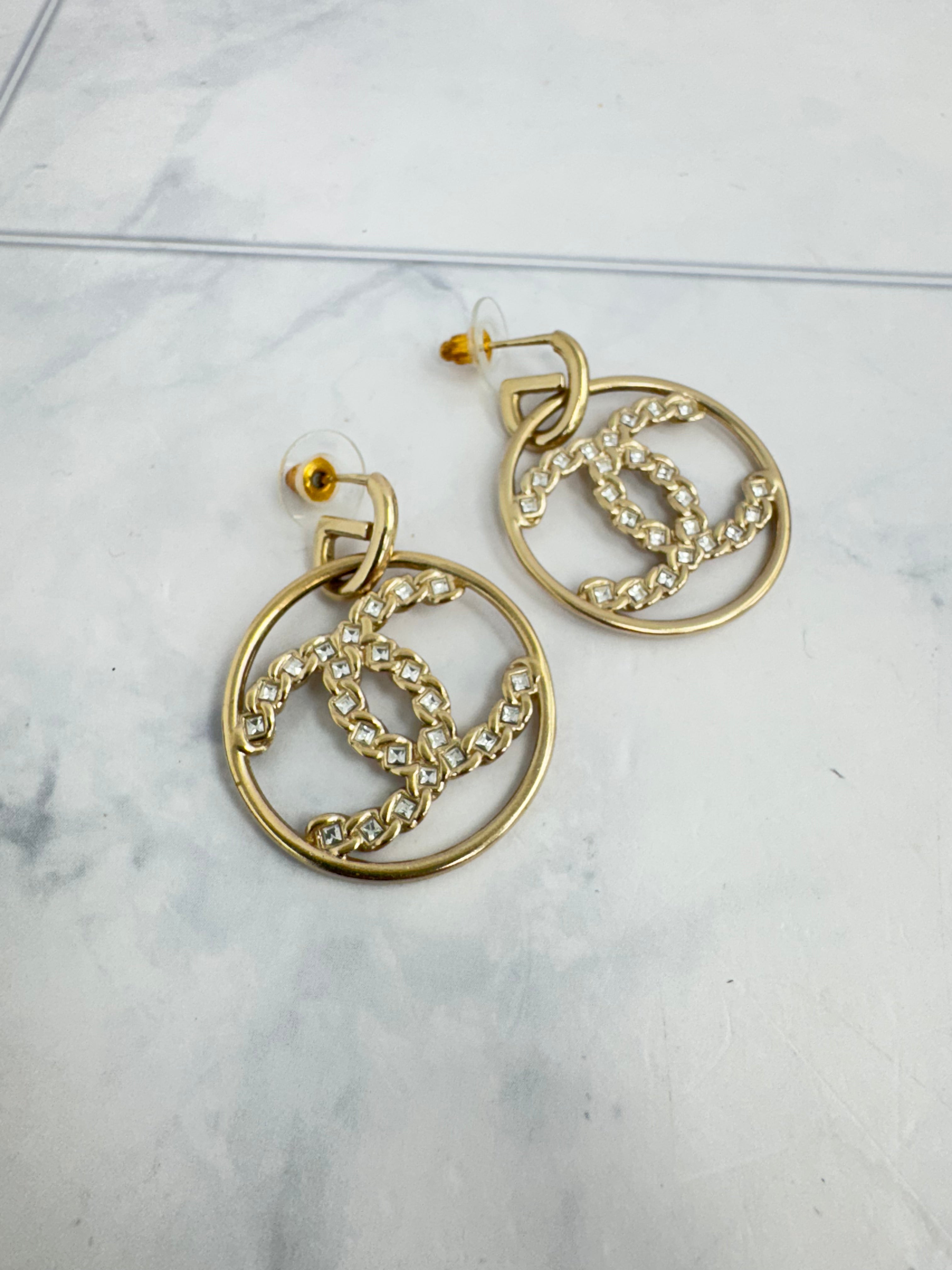Chanel Gold Tone Crystal High Society CC Dangle Hoop Earrings