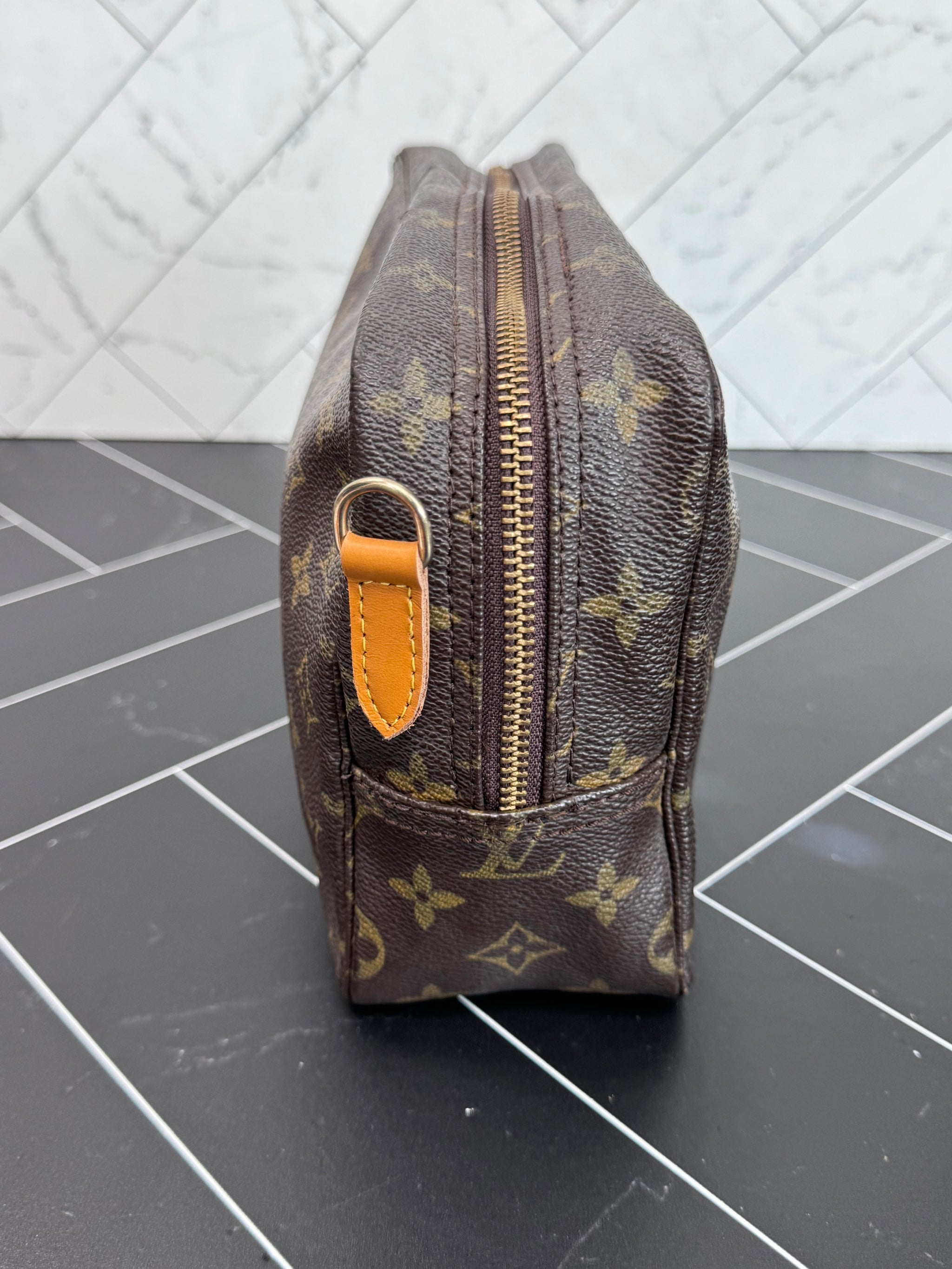 Louis Vuitton  Monogram Trousse 28