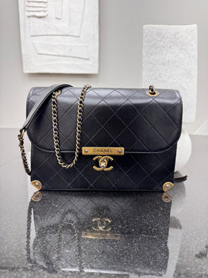 Chanel Black Diamond Quilted Leather Around The Corner Flap Bag