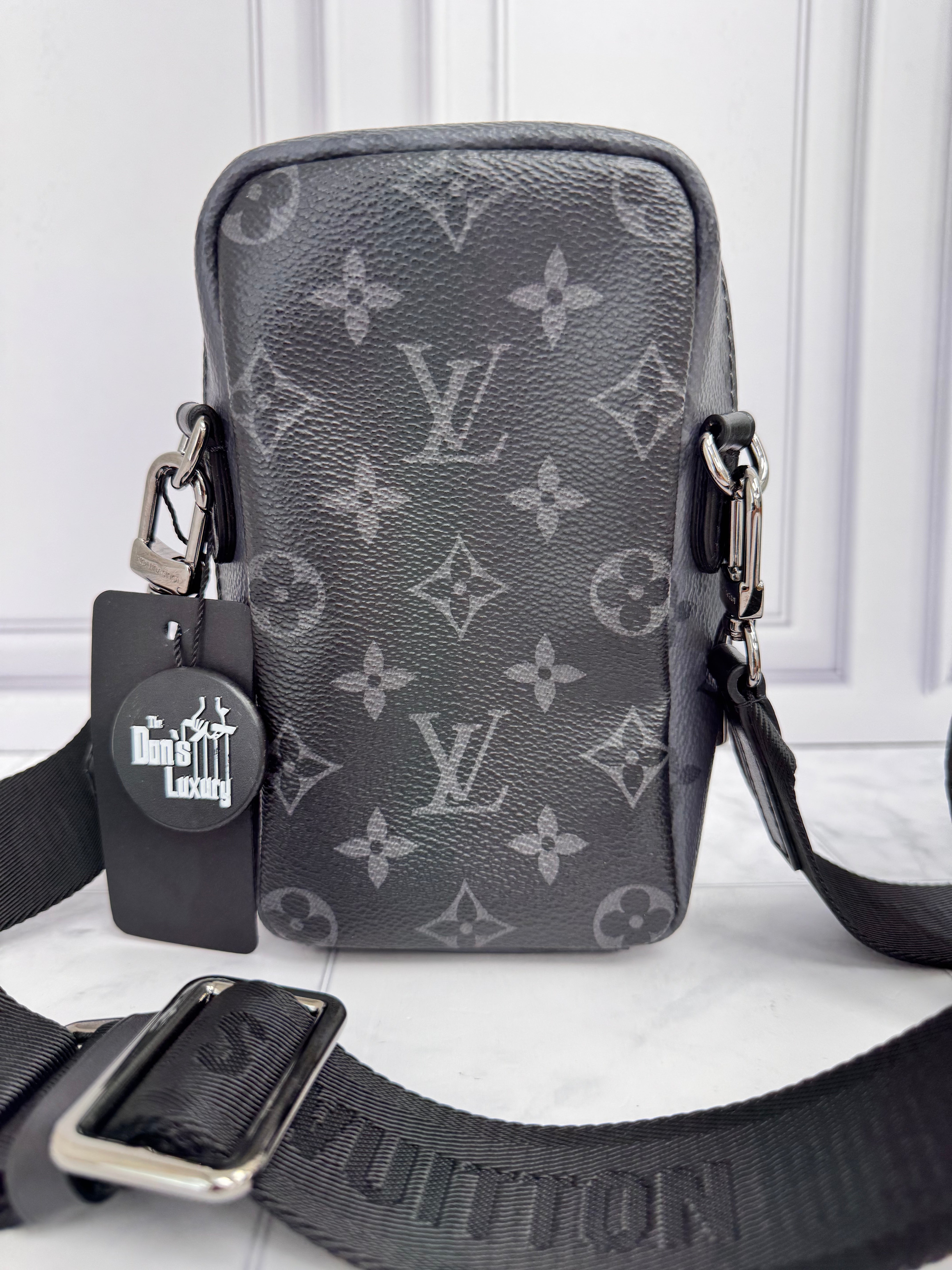 LIKE NEW  - Louis Vuitton Reverse Monogram Eclipse Canvas Double Phone Pouch NM