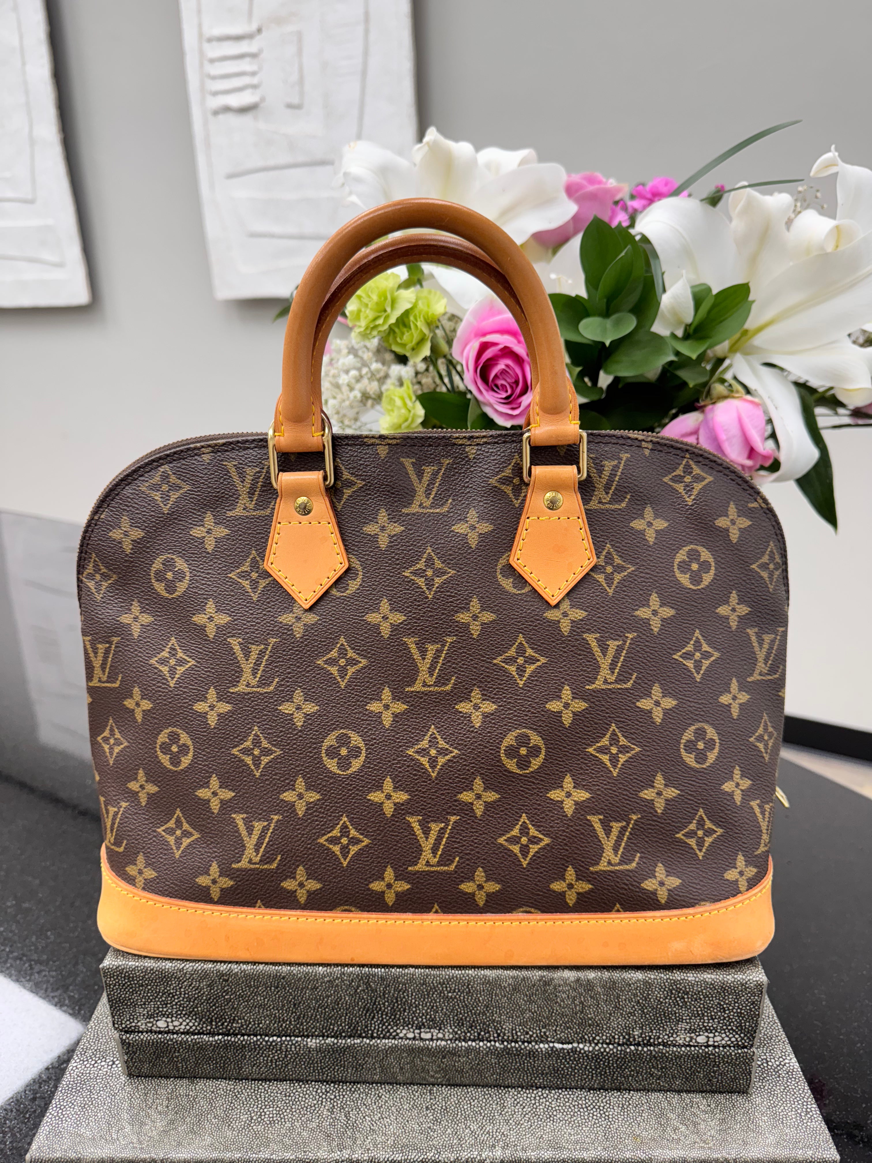 Louis Vuitton Monogram Alma PM Handbag
