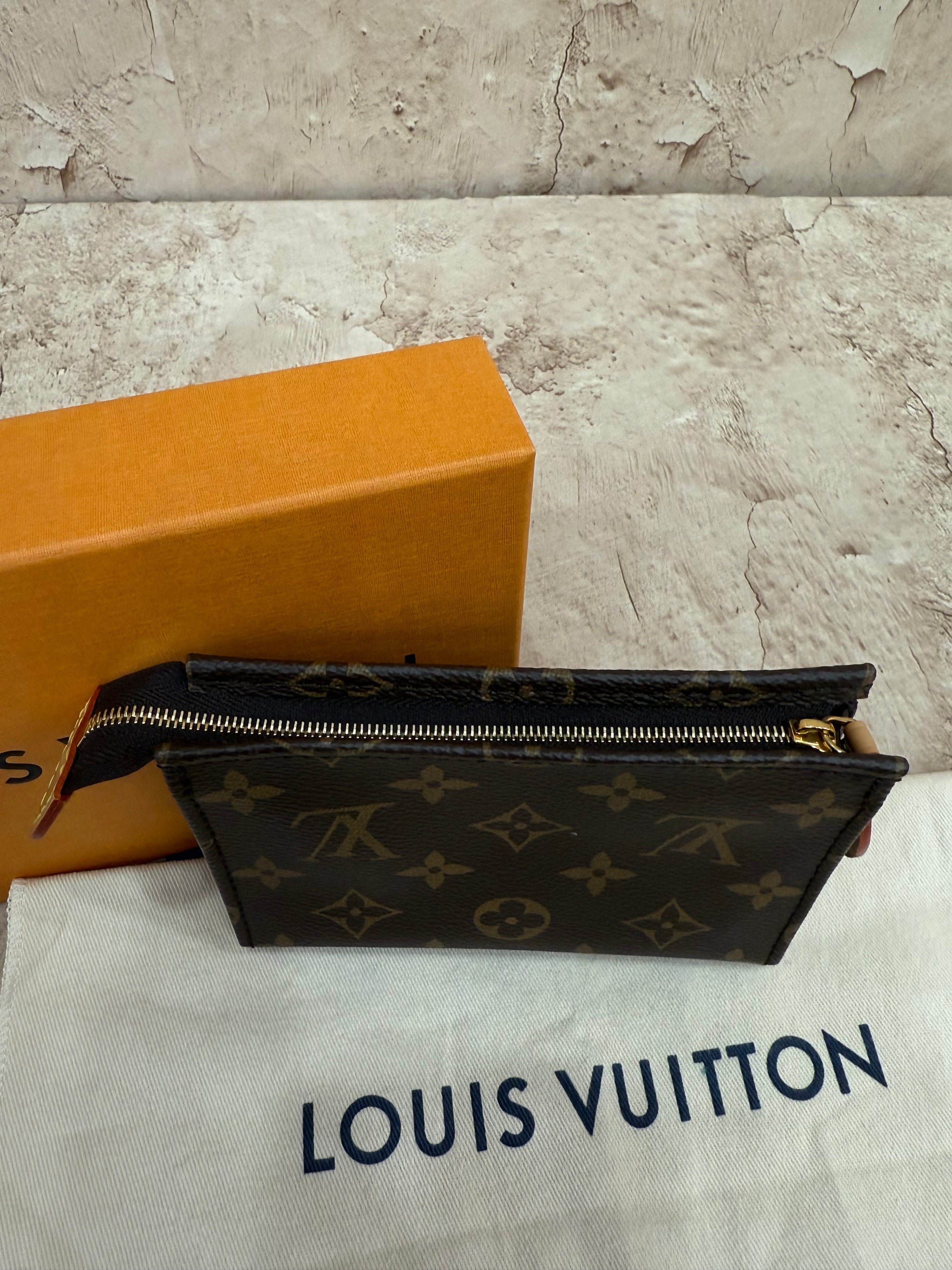 BRAND NEW Louis Vuitton Monogram Mini Toiletries Pouch