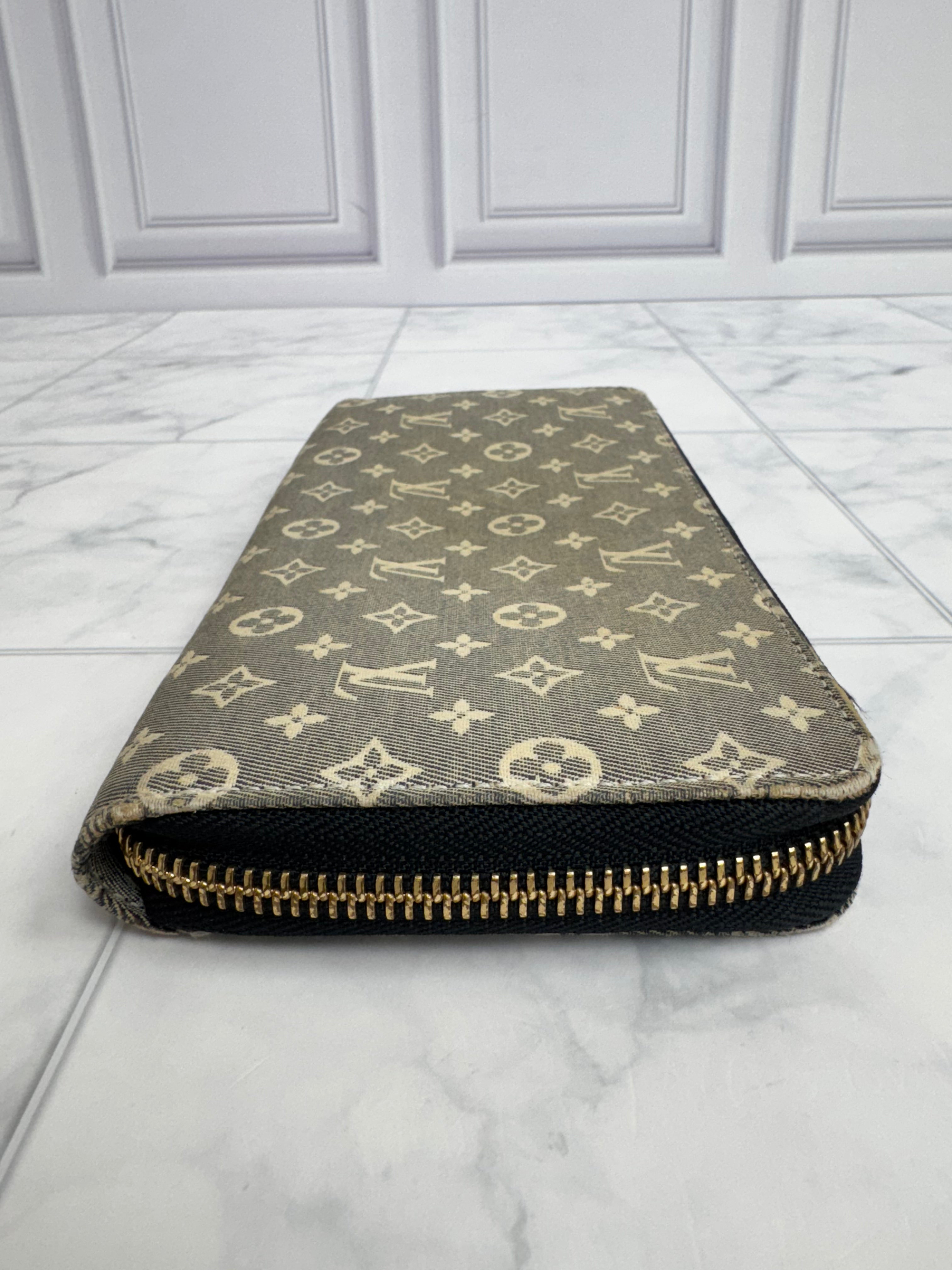 Louis Vuitton Mini Lin Monogram Zippy Wallet