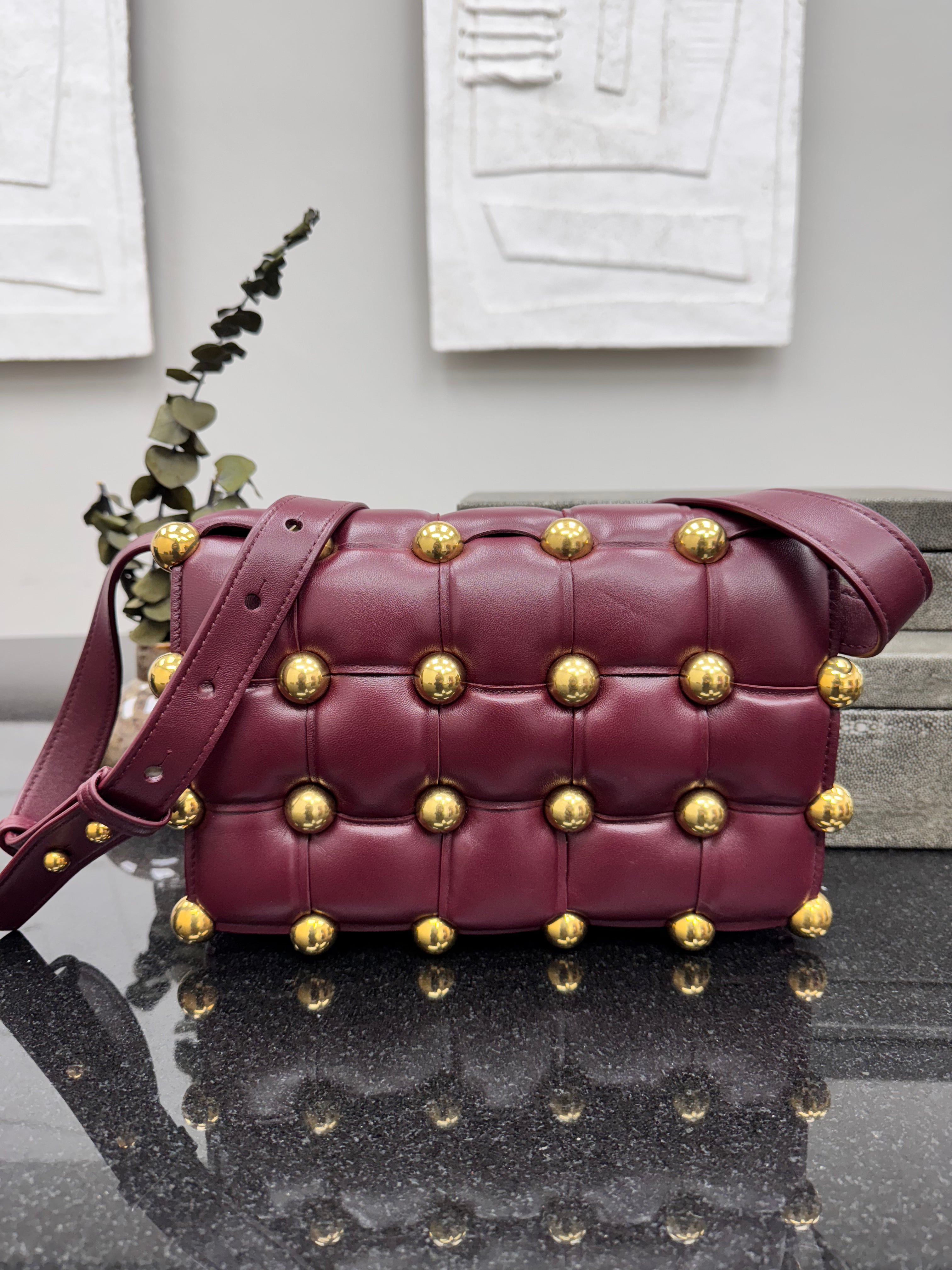 Bottega Veneta Burgundy Padded Maxi Intrecciato Leather Studded Cassette Crossbody Bag